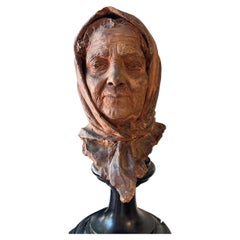 Terracotta sculpture depicting elderly woman signed Giuseppe Renda