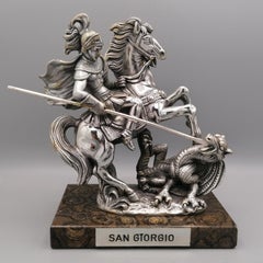 Scultura italiana laminata argento raffigurante San Giorgio che uccide il drago