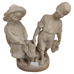 Sculpture représentant un couple d'enfants
