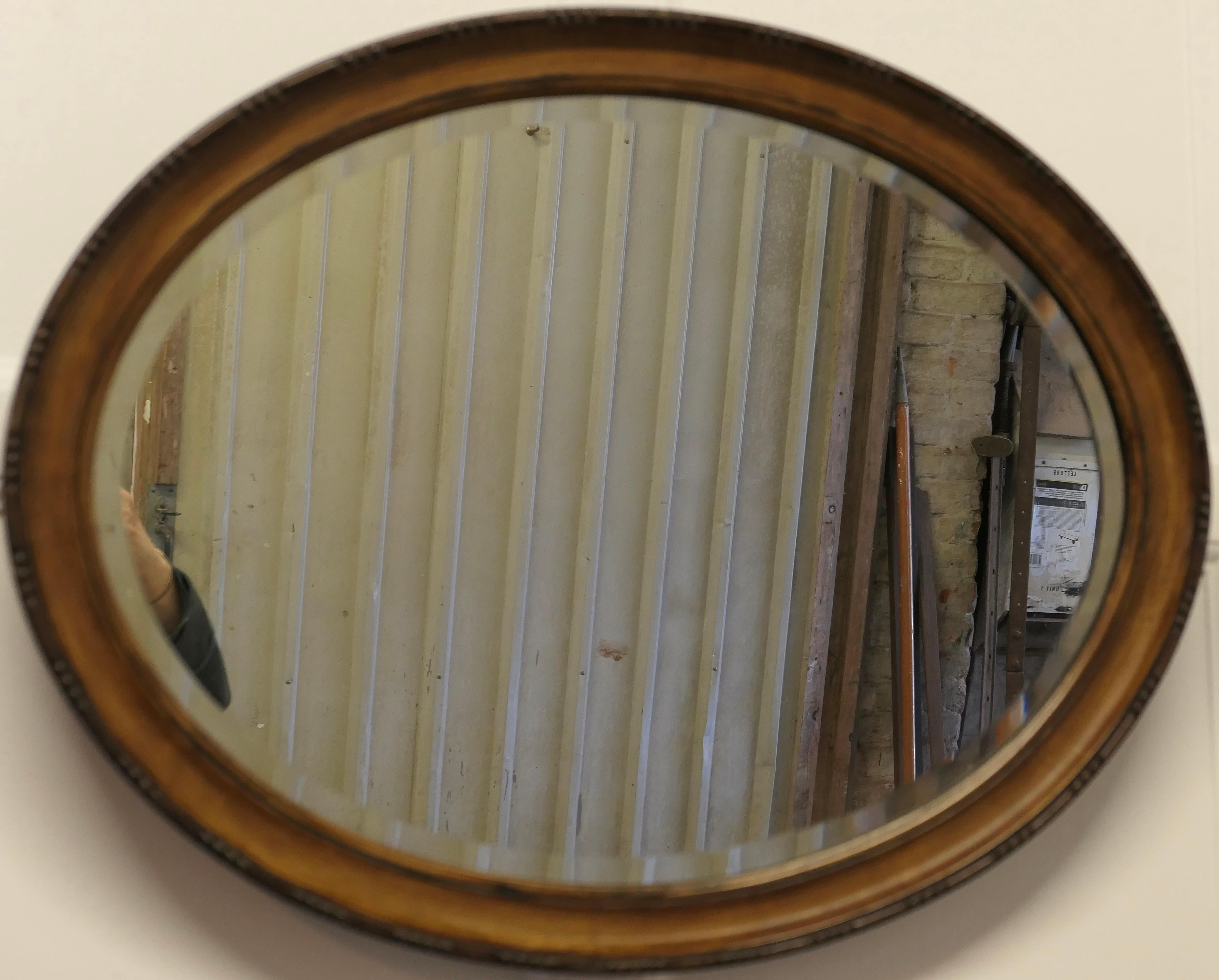 Art Deco Scumble Finish Oval Mirror This Mirror Has a Moulded Oval Frame For Sale