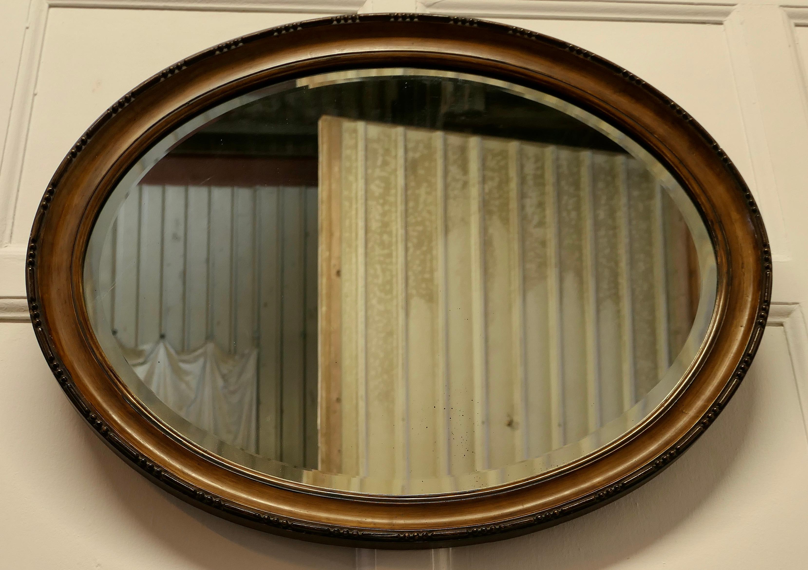 Early 20th Century Scumble Finish Oval Mirror This Mirror Has a Moulded Oval Frame For Sale