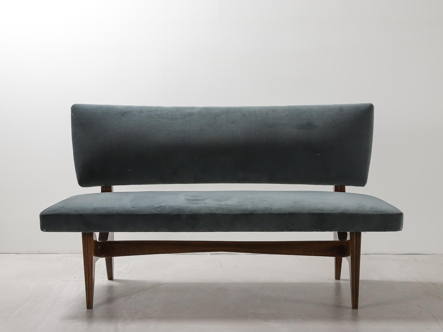 1950s Italian designed, Scuola Di Torino two seat sofa with wood frame and slate blue velvet upholstered seat and backrest.