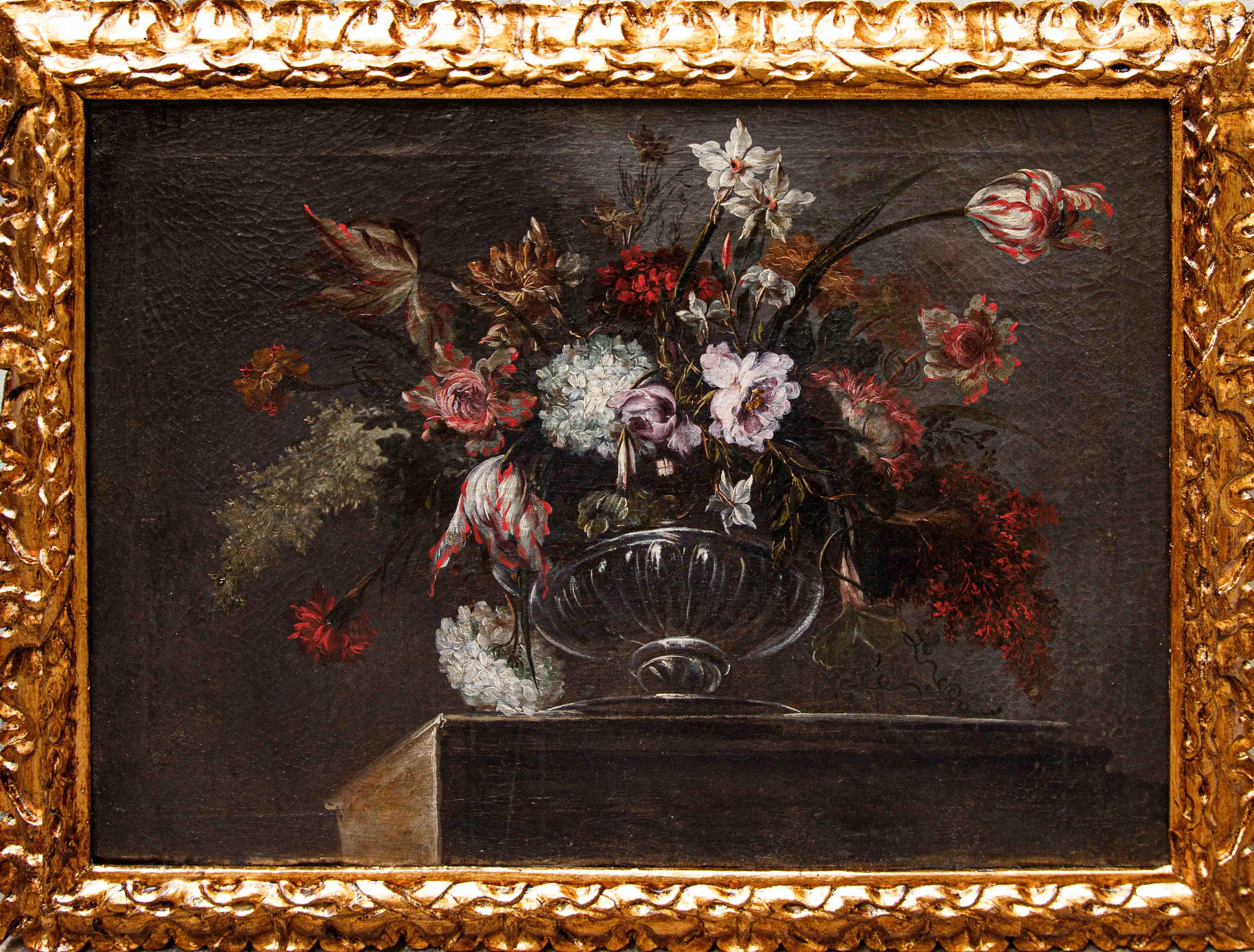 Scuola napoletana, XVIII secolo

Vaso di fiori su base in marmo

Olio su tela, cm 54 x 73

Con cornice, cm 64 x 83

La natura morta che raffigura, scorciato dal basso, un vaso metallico su basamento in pietra con un tripudio di fiori di diverse