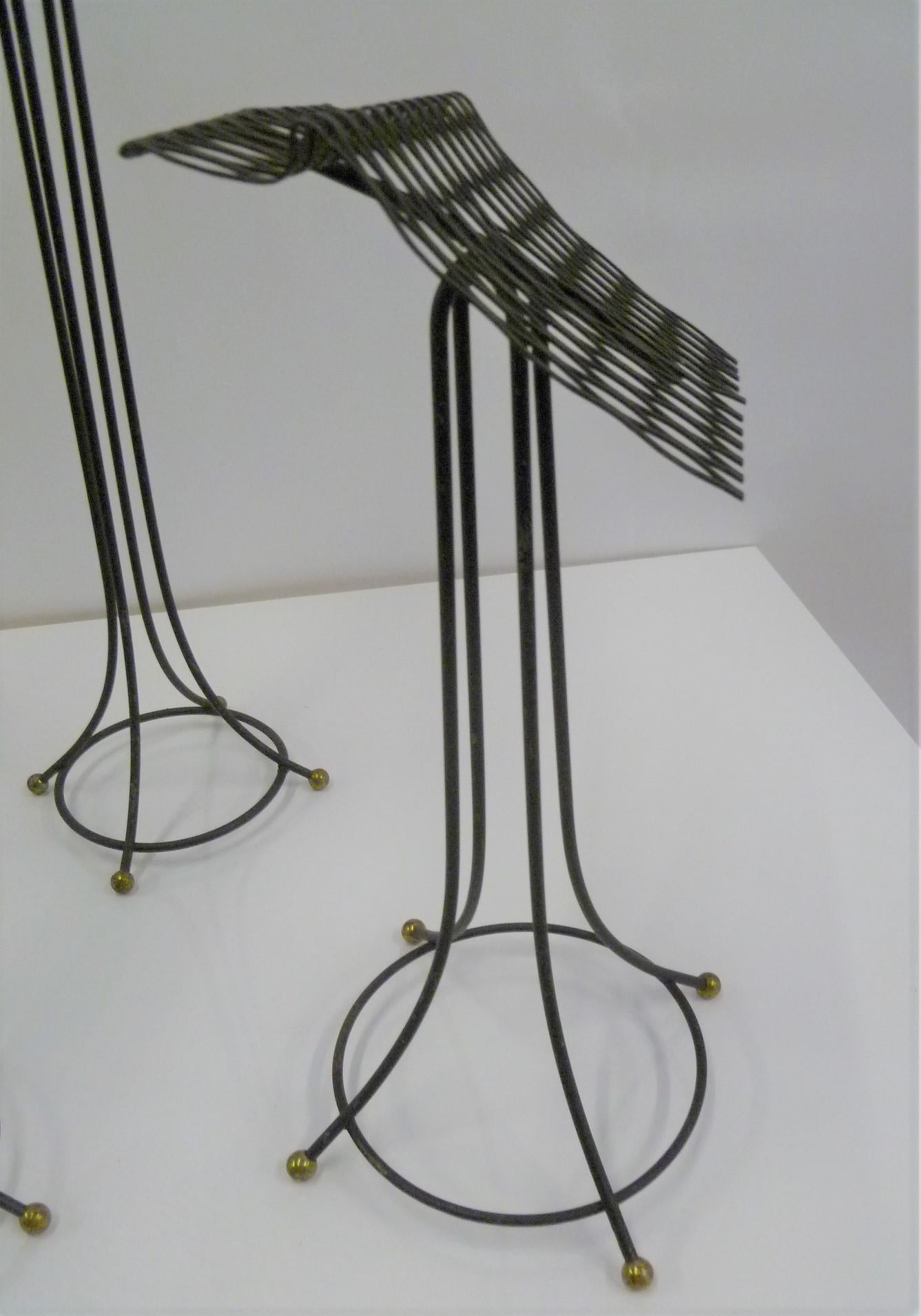 American Sculptural Group of 7 Modern Black Wire Store Display Stands, 1930s-1940s