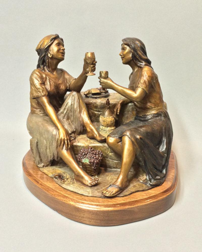 Scy Figurative Sculpture - "SALUTE" WOMEM TOASTING WINE. FROM HER WOMEN OF THE VINEYARD SERIES BRONZE