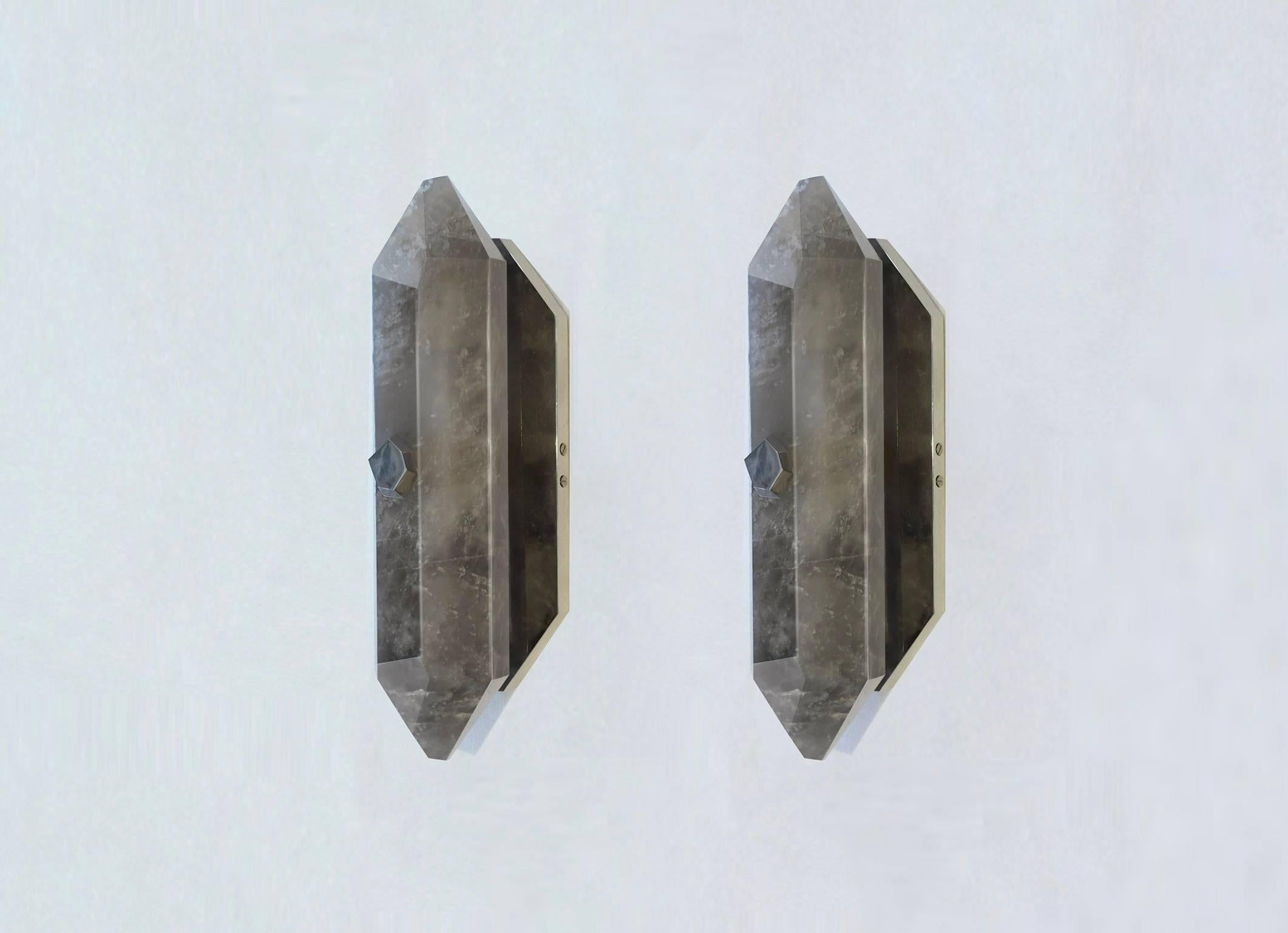 A fine carved diamond form dark rock crystal quartz wall sconces with the polish nickel finish mount. created by Phoenix Gallery.
Custom measurement and finish available.
Each sconce installed two sockets, each socket use 60 watts LED light bulb and
