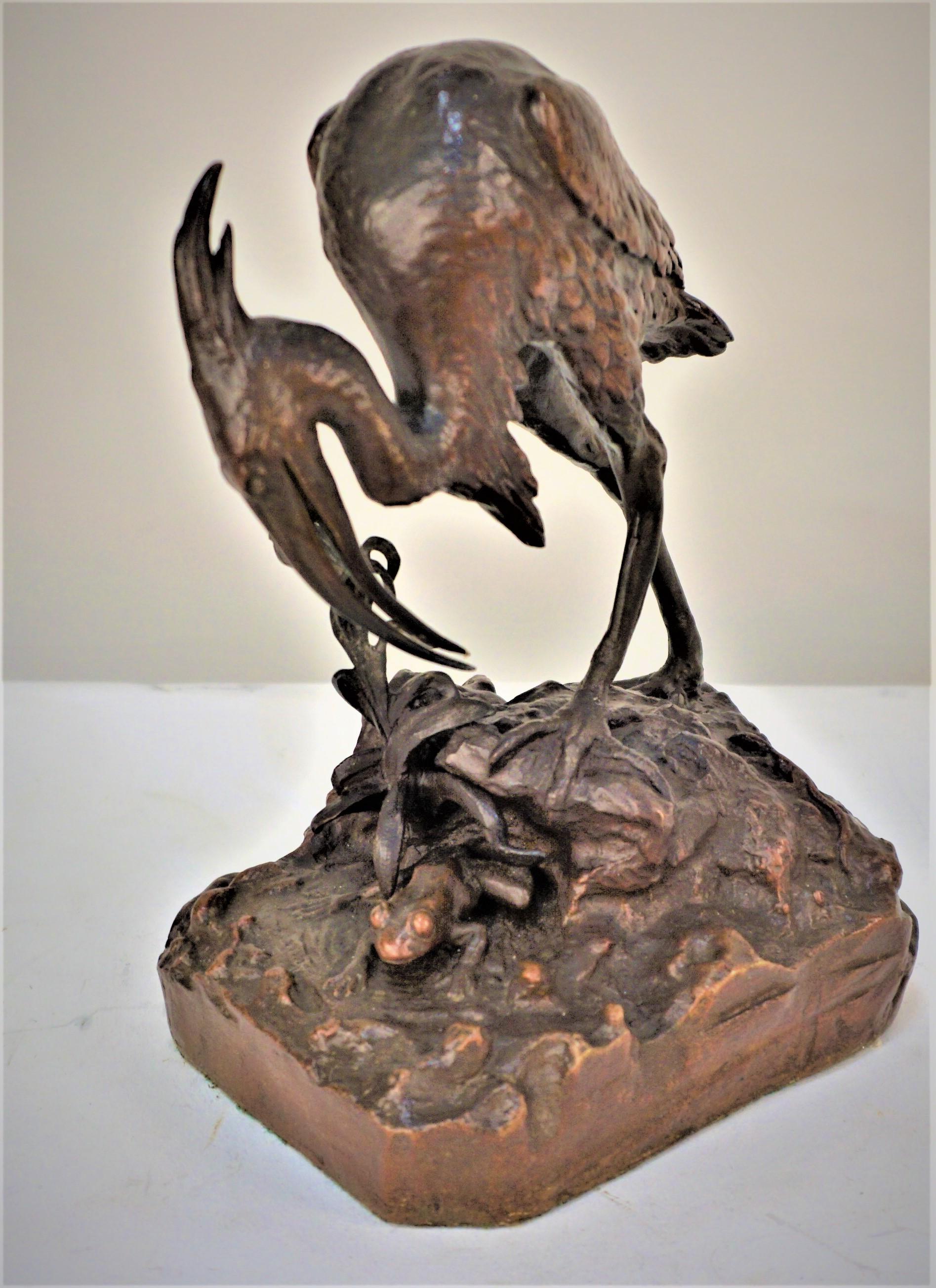 Beautiful brown patina bronze sculpture of sea bird wit forge.