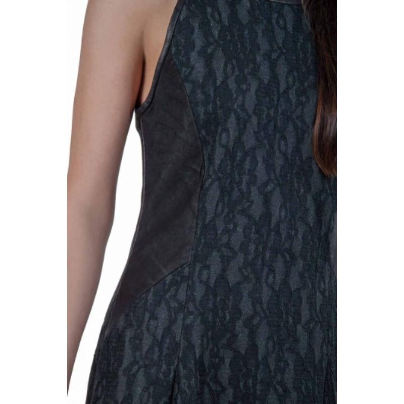 Opta por este vestido Mar si buscas algo divertido y femenino. Este vestido de encaje negro tiene todo lo que lo convierte en una pieza elegante y voguish. Este conjunto sin mangas se completa con un escote redondo y paneles de piel a los lados.