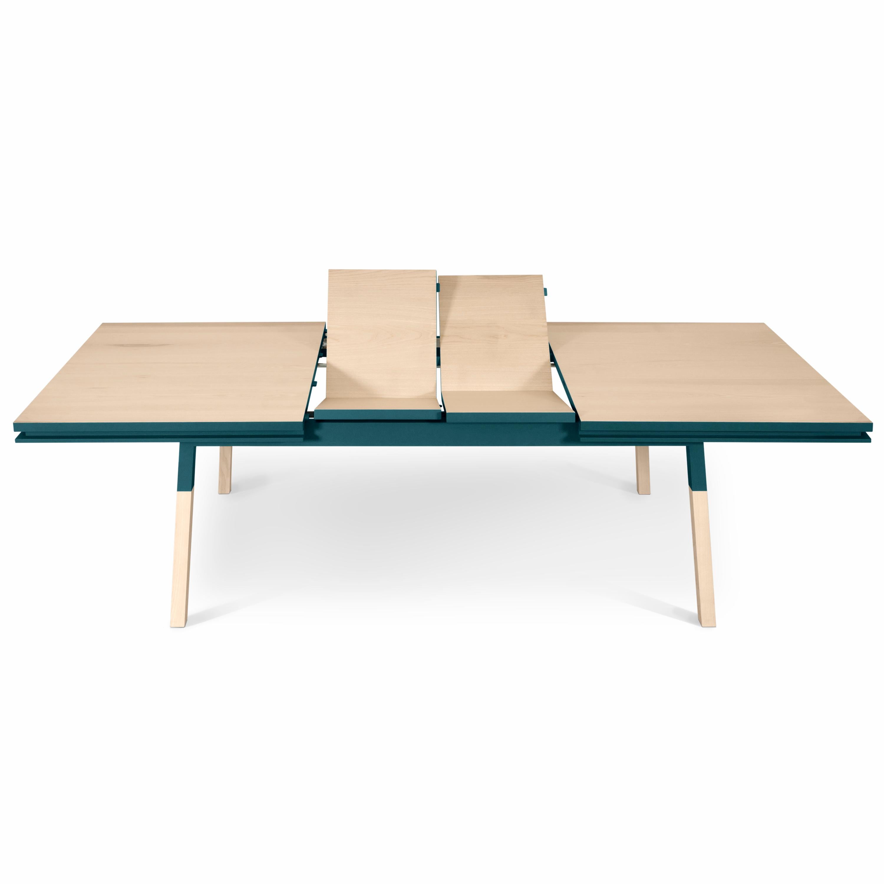 This rectangular dining table is proposed with 2 integrated and folded extensions. 

It is made of 100% solid ash wood from sustainably managed and PEFC certified French forests.

The 3 lengths are 220 cm / 86.6 in when the table is closed, 260 cm /