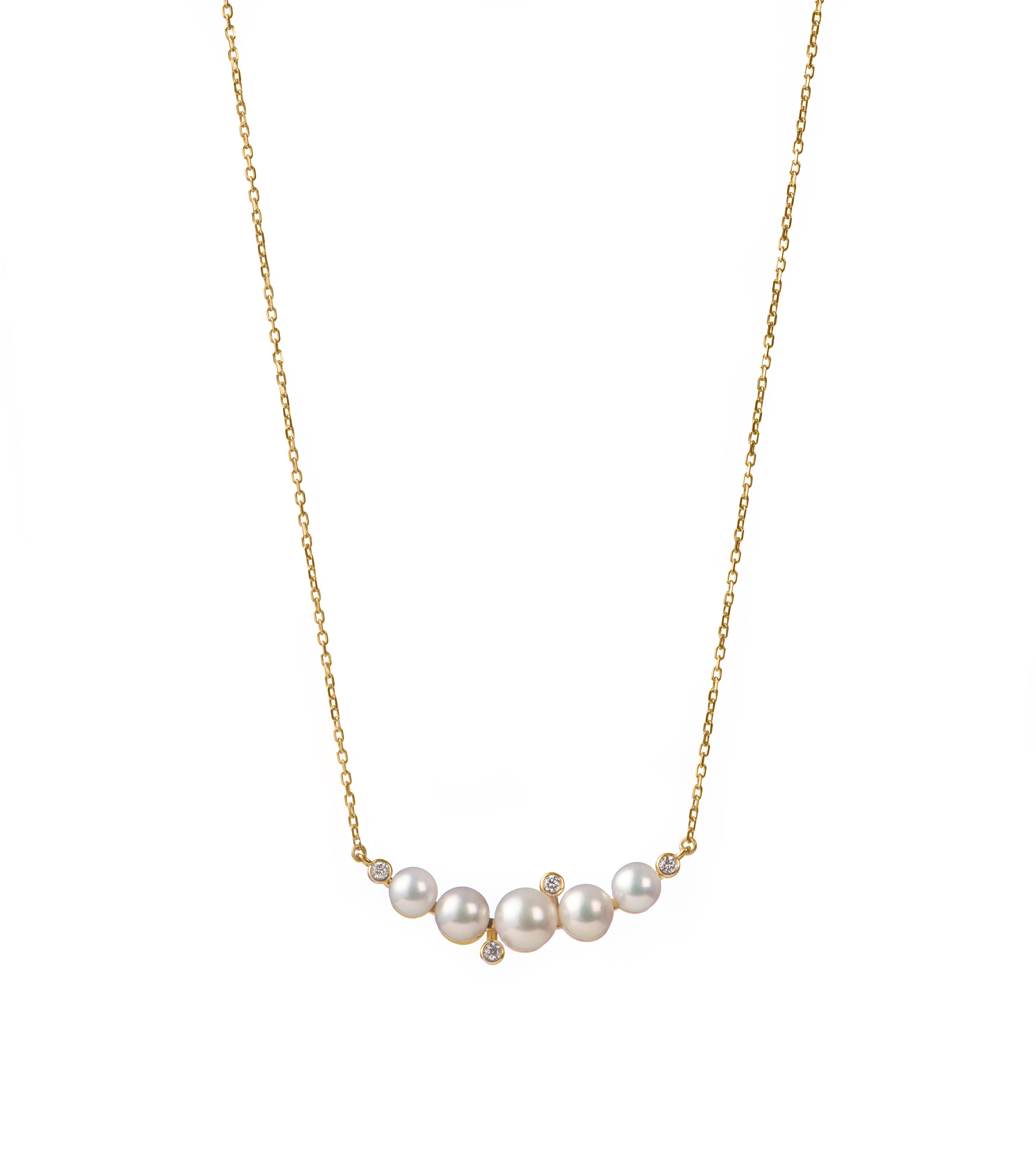 Drawing inspiration from the rising foam in the sea, this necklace features a soft curve of freshwater pearls and is illuminated by glimmering natural diamonds, set on an 18 Karat Gold chain.
18 Karat Yellow Gold
Natural Diamonds, with total carat