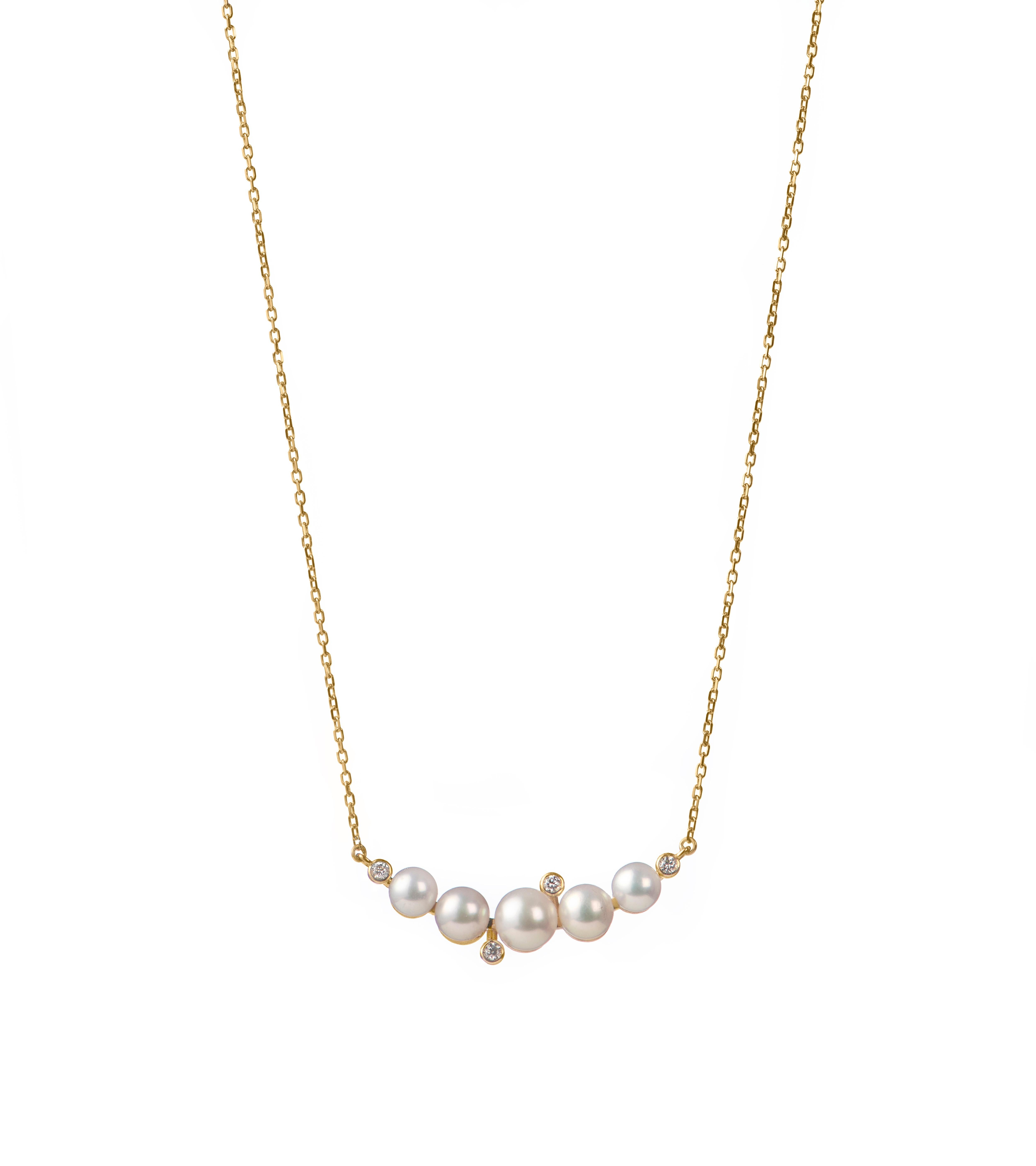 Drawing inspiration from the rising foam in the sea, this necklace features a soft curve of freshwater pearls and is illuminated by glimmering natural diamonds, set on an 18 Karat Gold chain.
18 Karat Yellow Gold
Natural Diamonds, with total carat