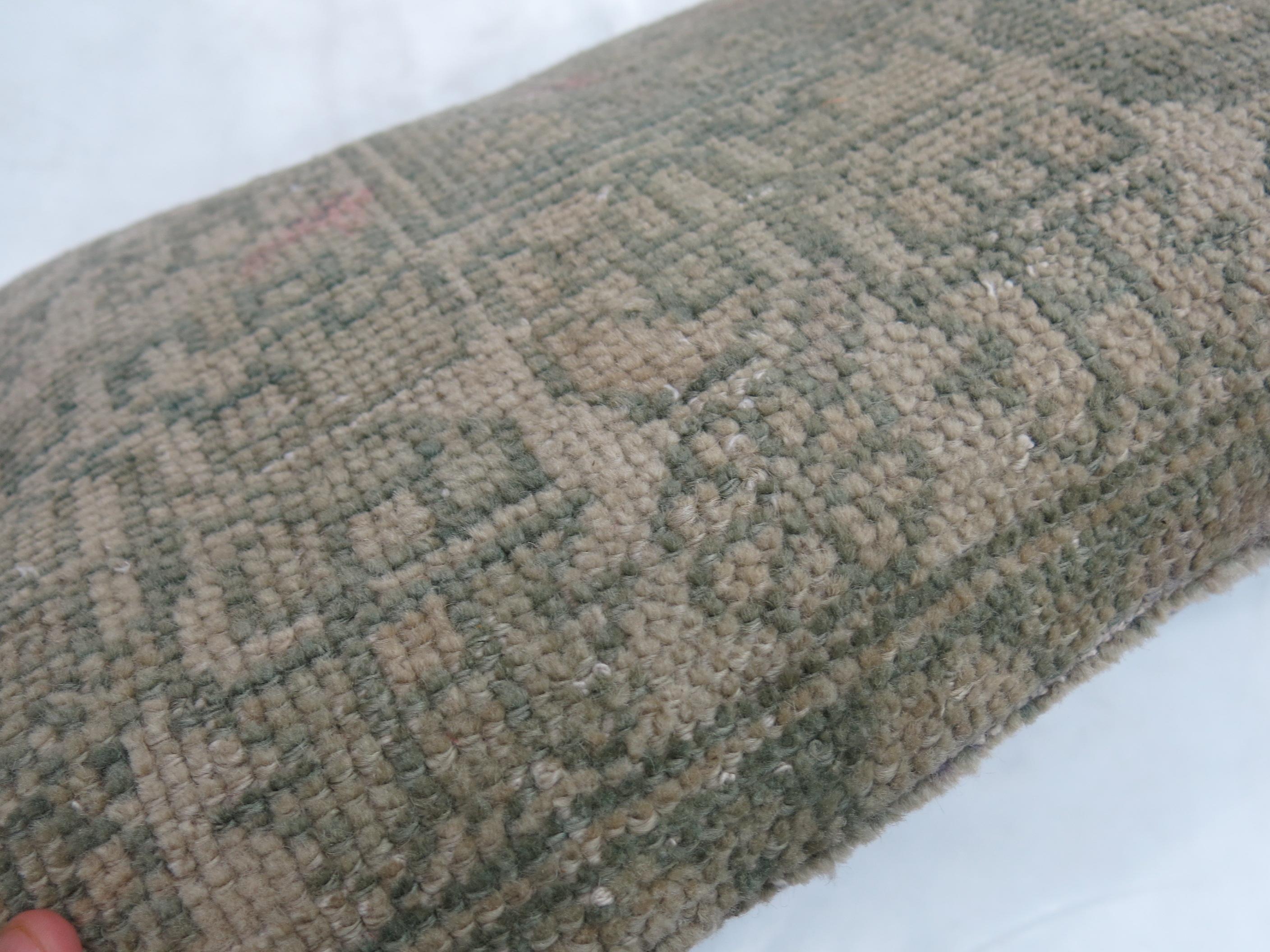 Pillow made from an early 20th-century oushak rug in a seafoam green

Measures: 16