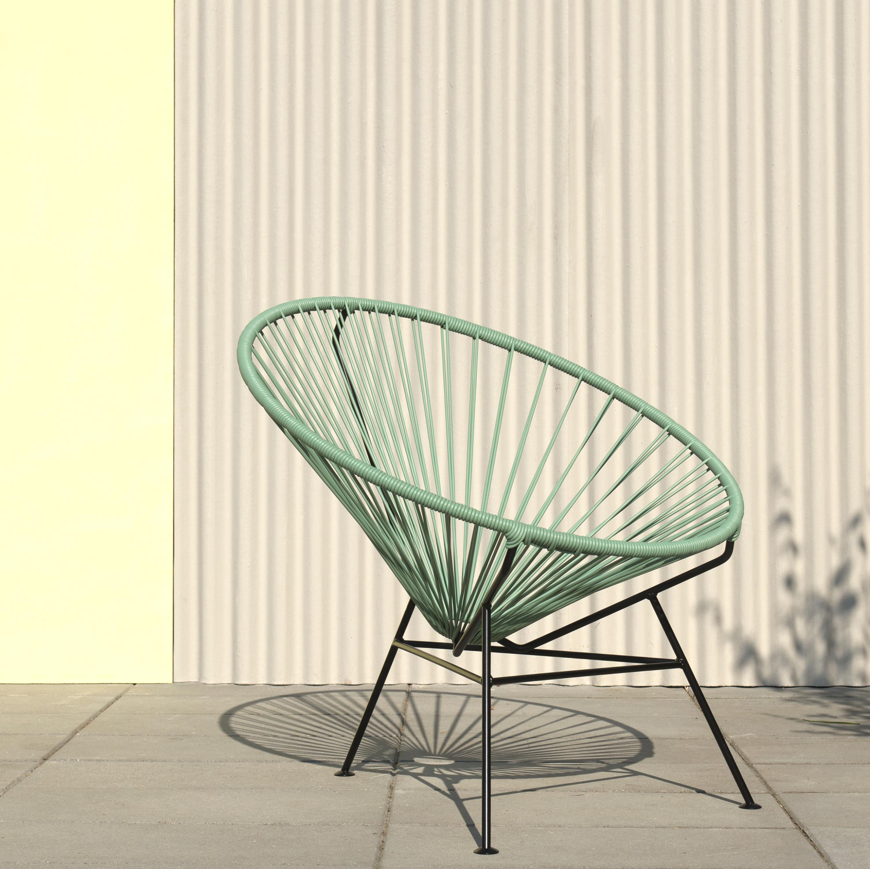 Sea Green Condesa Chair by OK Design
Dimensions: D 80 x W 80 x H 78 cm.
Materials: Powder-coated metal, PVC cord.

Available with black frame, or white frame.
Available in other colors. Please contact us.

The Condesa chair takes its name from the