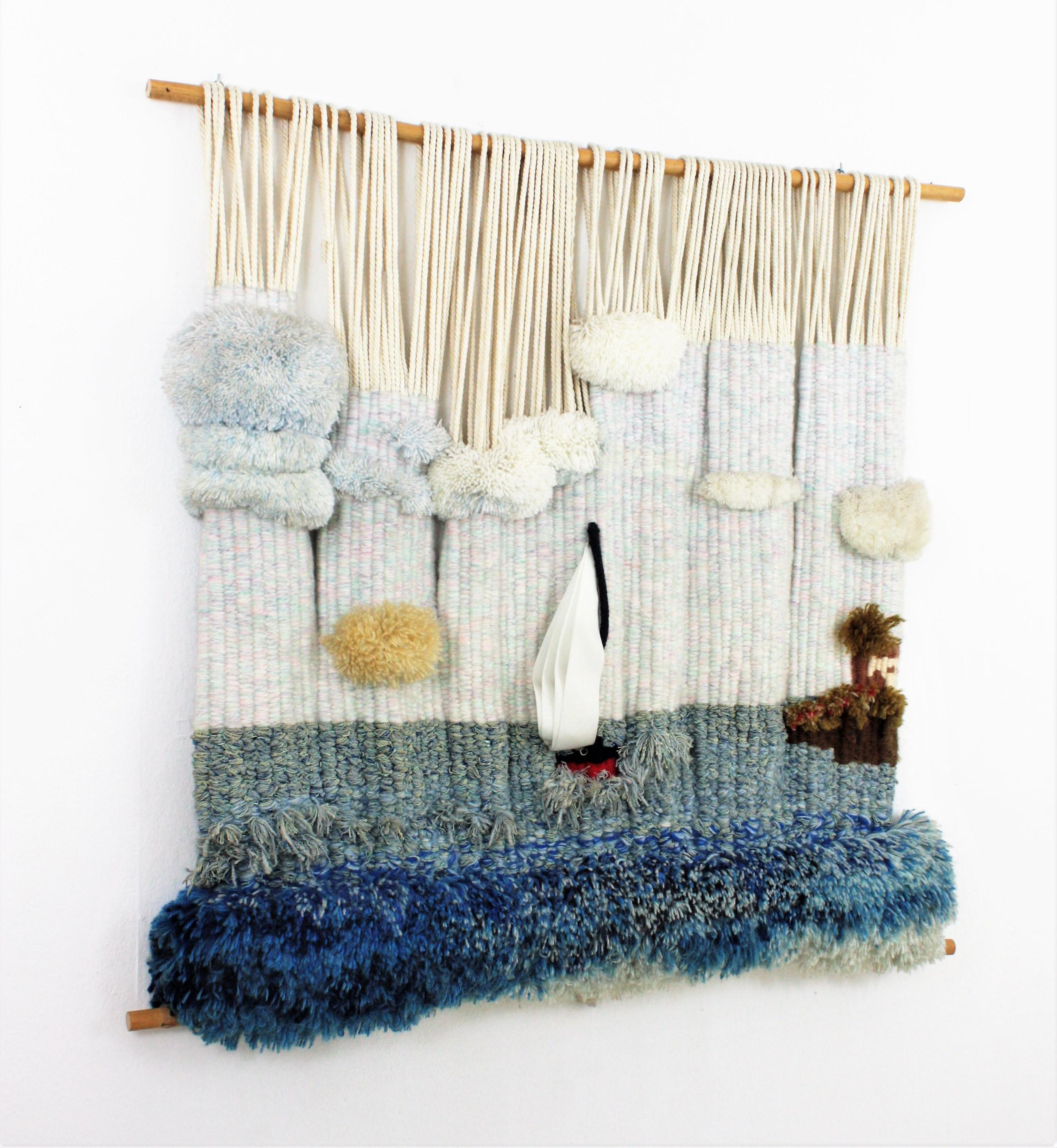 One of a kind large scale hand knitted wool Macrame wall hanging tapestry with sea landscape design, Spain, 1970s.
This wall art tapestry is all made by hand with handwoven and dyed wool and fibers in different shades of blue, white and pastel