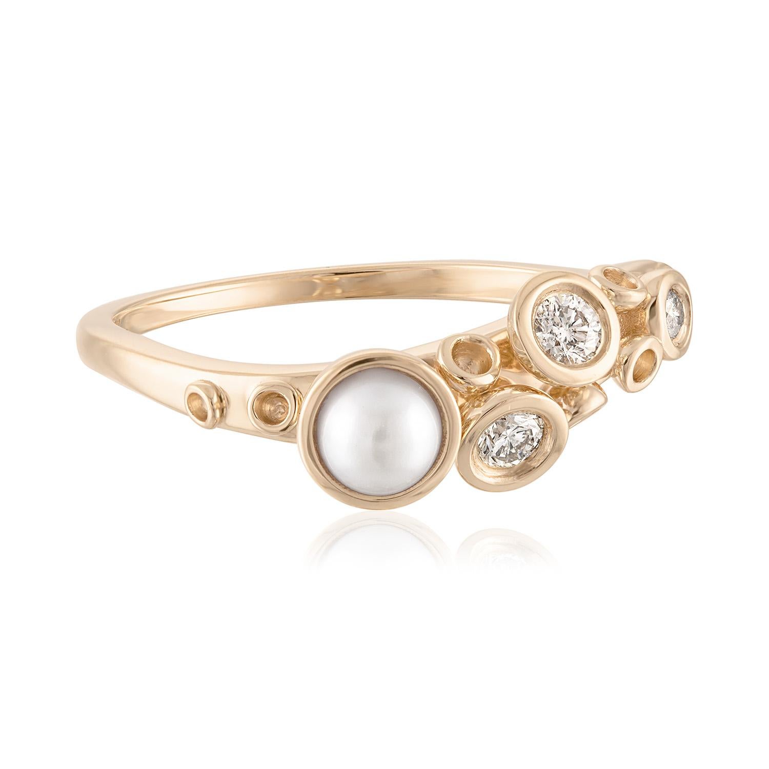Crafted in elegant 14k gold, this enchanting ring captures the essence of the deep sea. Its intricate design features delicate tentacles adorned with shimmering diamonds, cradling a lustrous round pearl. But what truly sets this ring apart is its