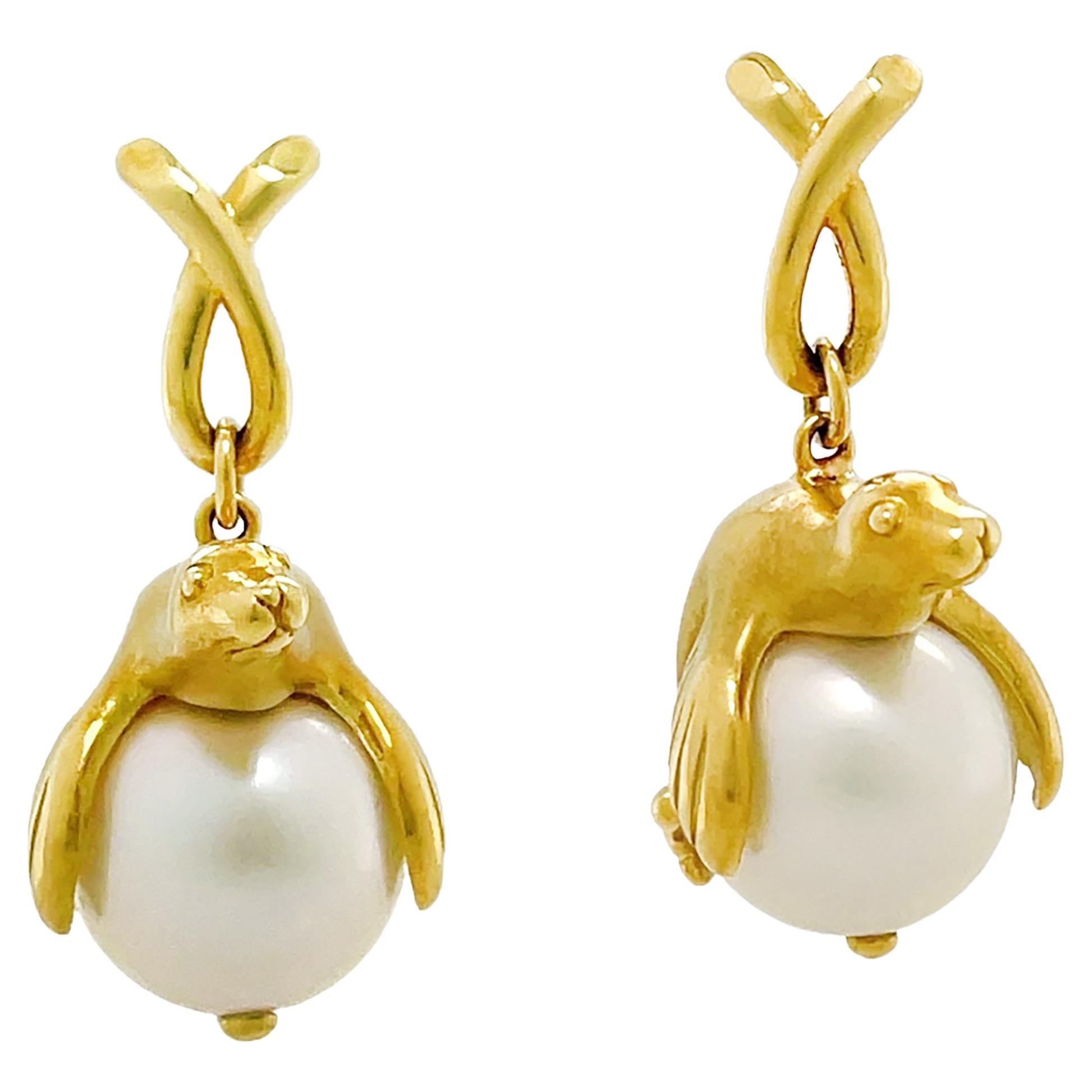 18K Yellow Gold Sea Lion Sitting on South Sea Pearl Earrings For Sale