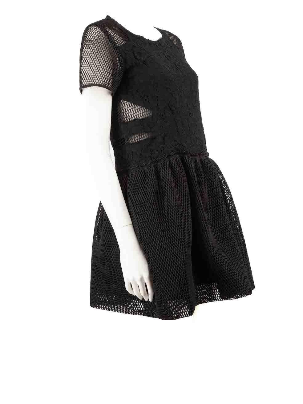 CONDITION is Very good. Minimal wear to dress is evident. Minimal frayed edges to neckline and waistline on this used See New York designer resale item.
 
 Details
 Black
 Polyester
 Dress
 Mini
 Short sleeves
 Lace panel top
 Round neck
 Back zip