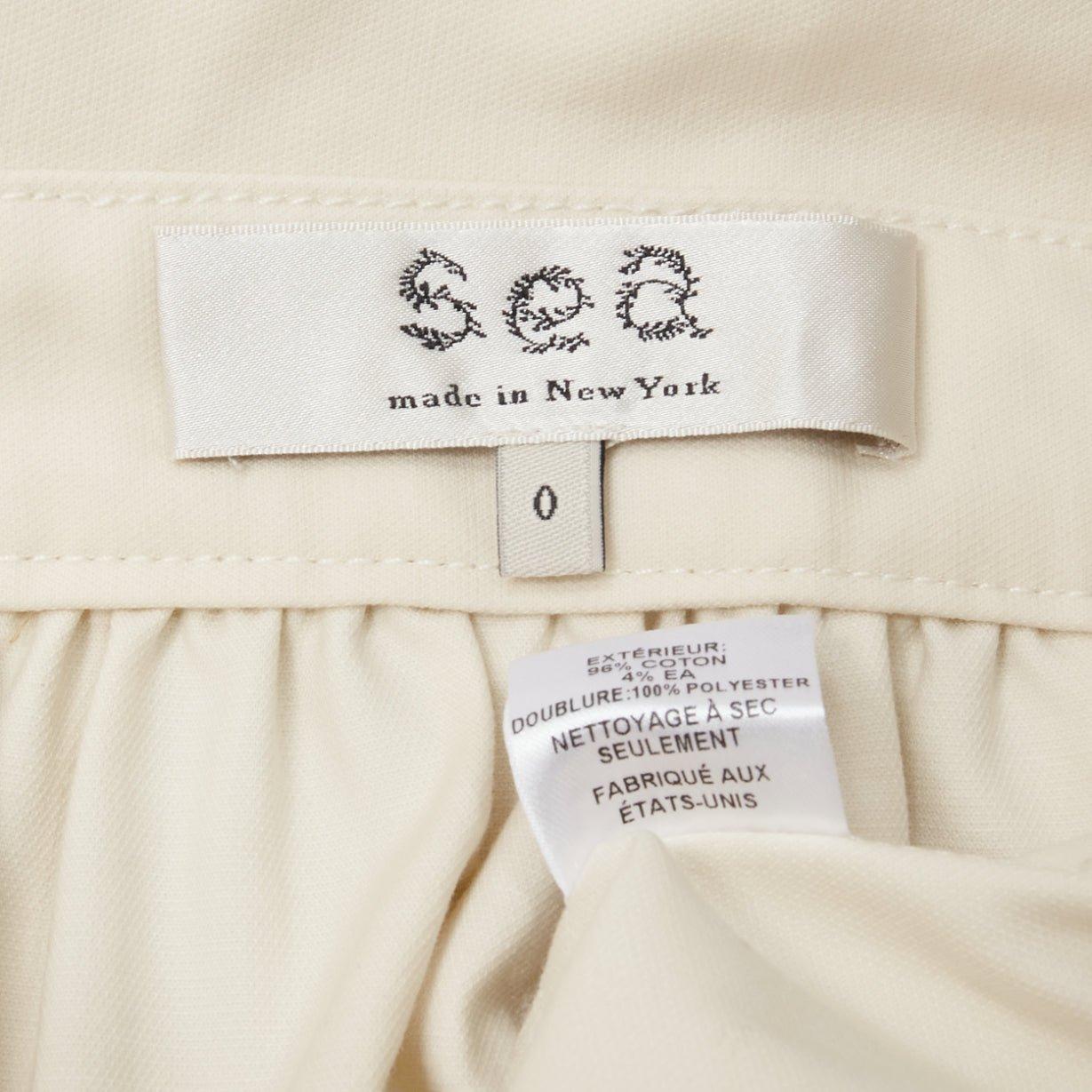 SEA NEW YORK cream cotton peplum pocket flap belt waist A-line skirt US0 XS For Sale 4