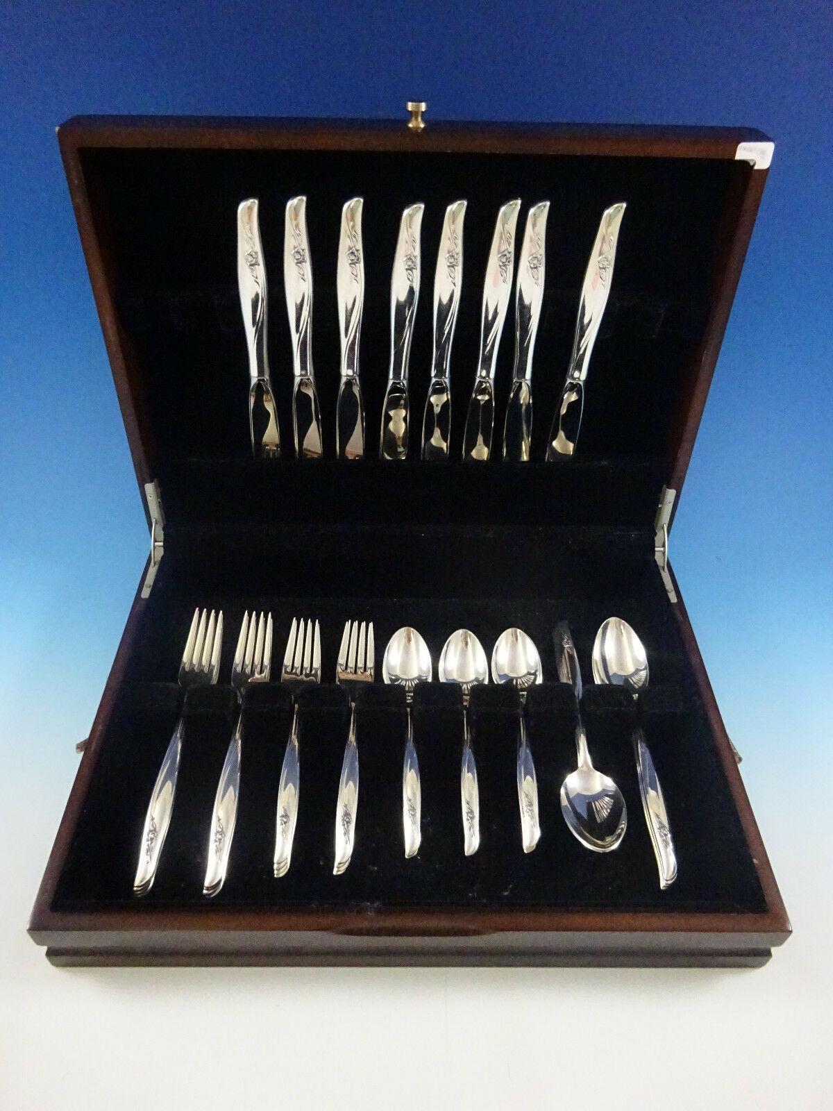 Modern, flowing-style sea rose by Gorham, circa 1958, sterling silver flatware set - 40 pieces. This set includes:

8 knives, 9 1/4