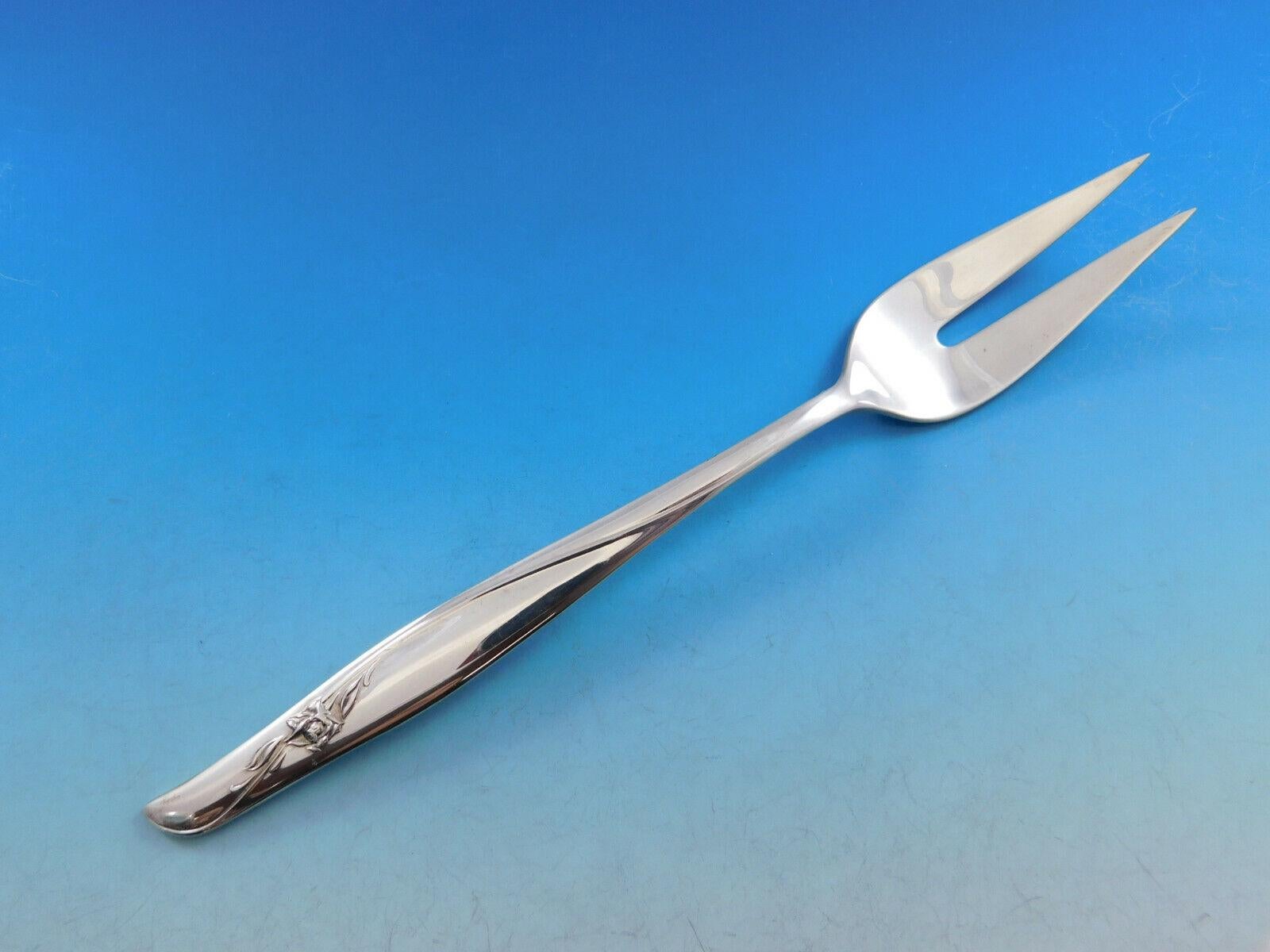 Sea Rose by Gorham Sterling Silver Flatware set - 53 pieces. This pattern has a flowing modern design and was designed by Richard L. Huggins in the year 1958. This set includes:

12 Knives, 9 1/4