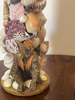 Sea Shell Encrusted Candlesticks with Orbs and Monkeys Figures