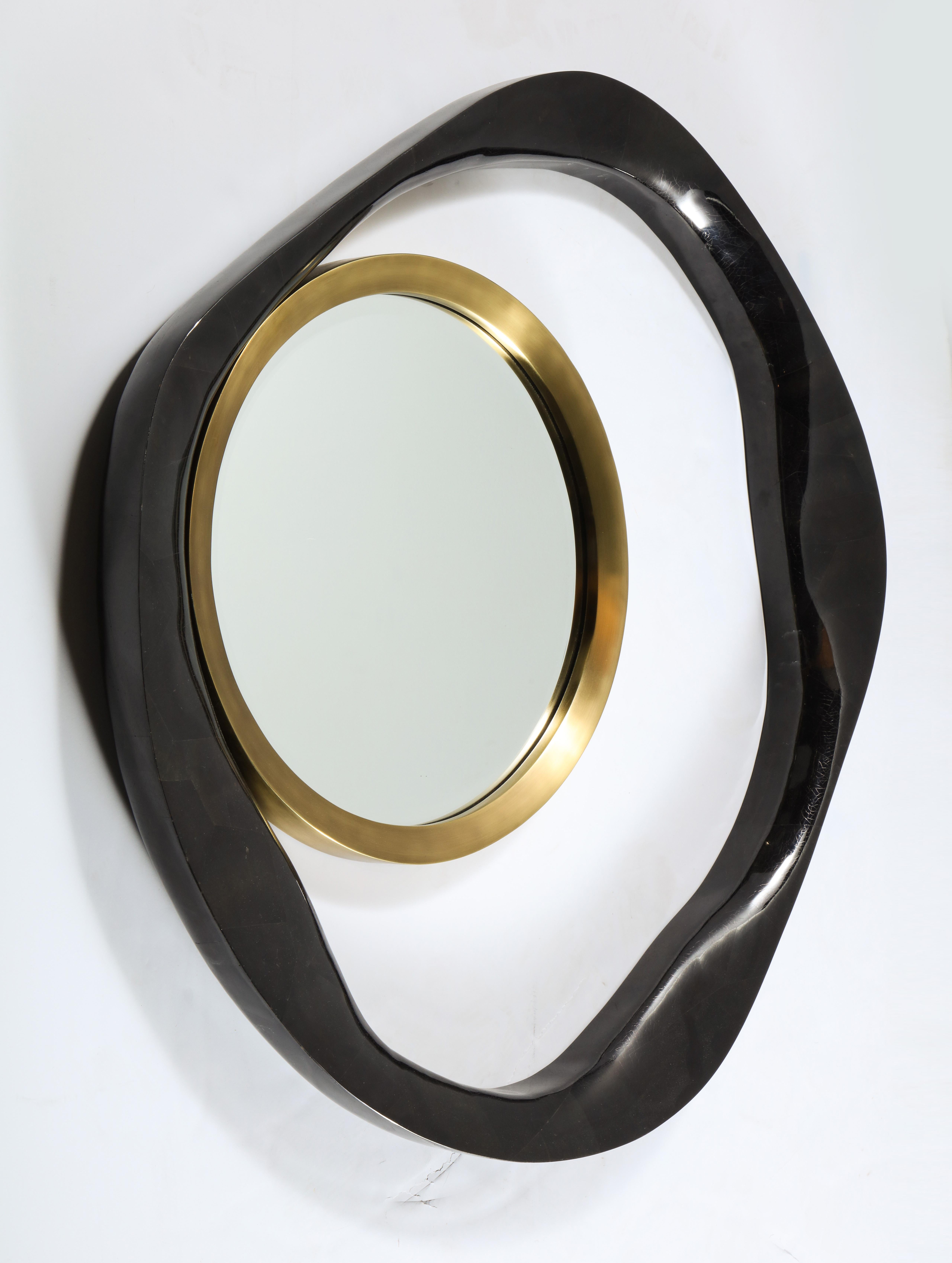 Decorative black organic shaped sea shell and brass mirror. You can hang it in three different ways. Designed in France. This is the large size. 
Production time is 15-16 weeks plus delivery.
 
