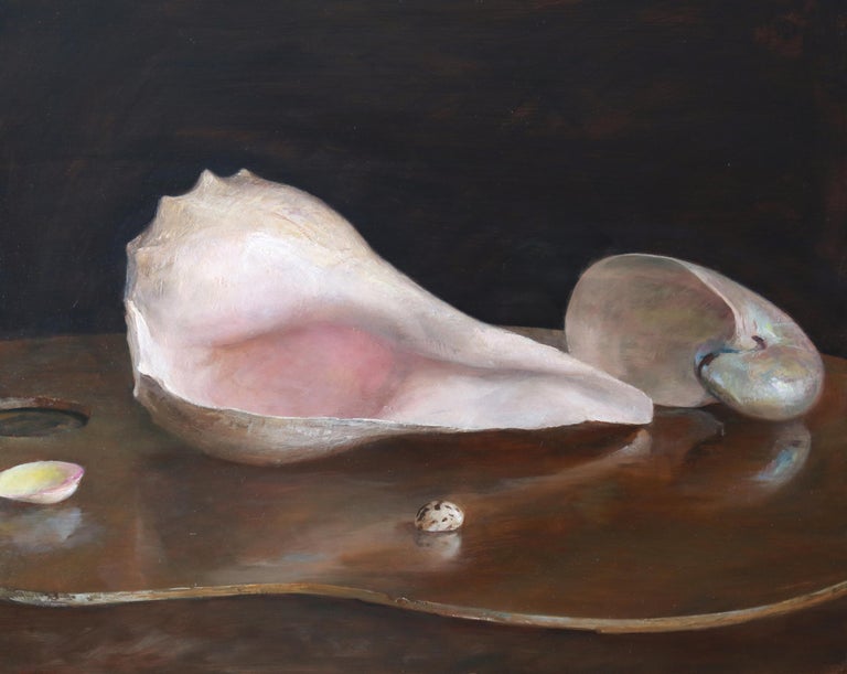 An arrangement of four shells lie on a reflective artist's palette. The large conch shell in the center of the painting dominates the space in subtle hues of cream and pink. The rich, dense colors of the background add to the meditative quality of