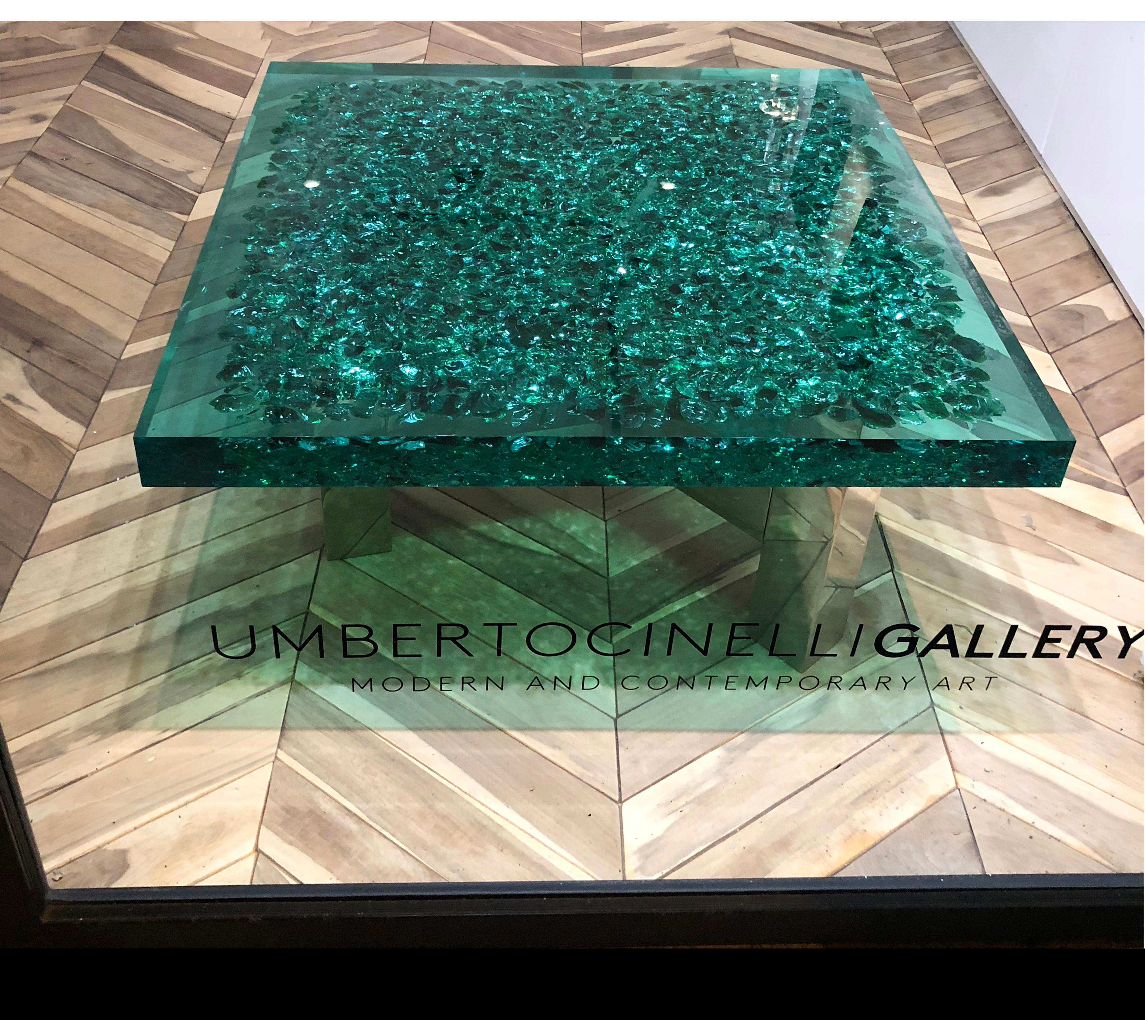 Sea Green Murano glass and Lucite coffee table with nickel-plated brass base. 
This is indeed an outstanding eyecatcher suitable to any room, and one of the most appreciated pieces of our collection. You'll see, it will give its best nearby a light