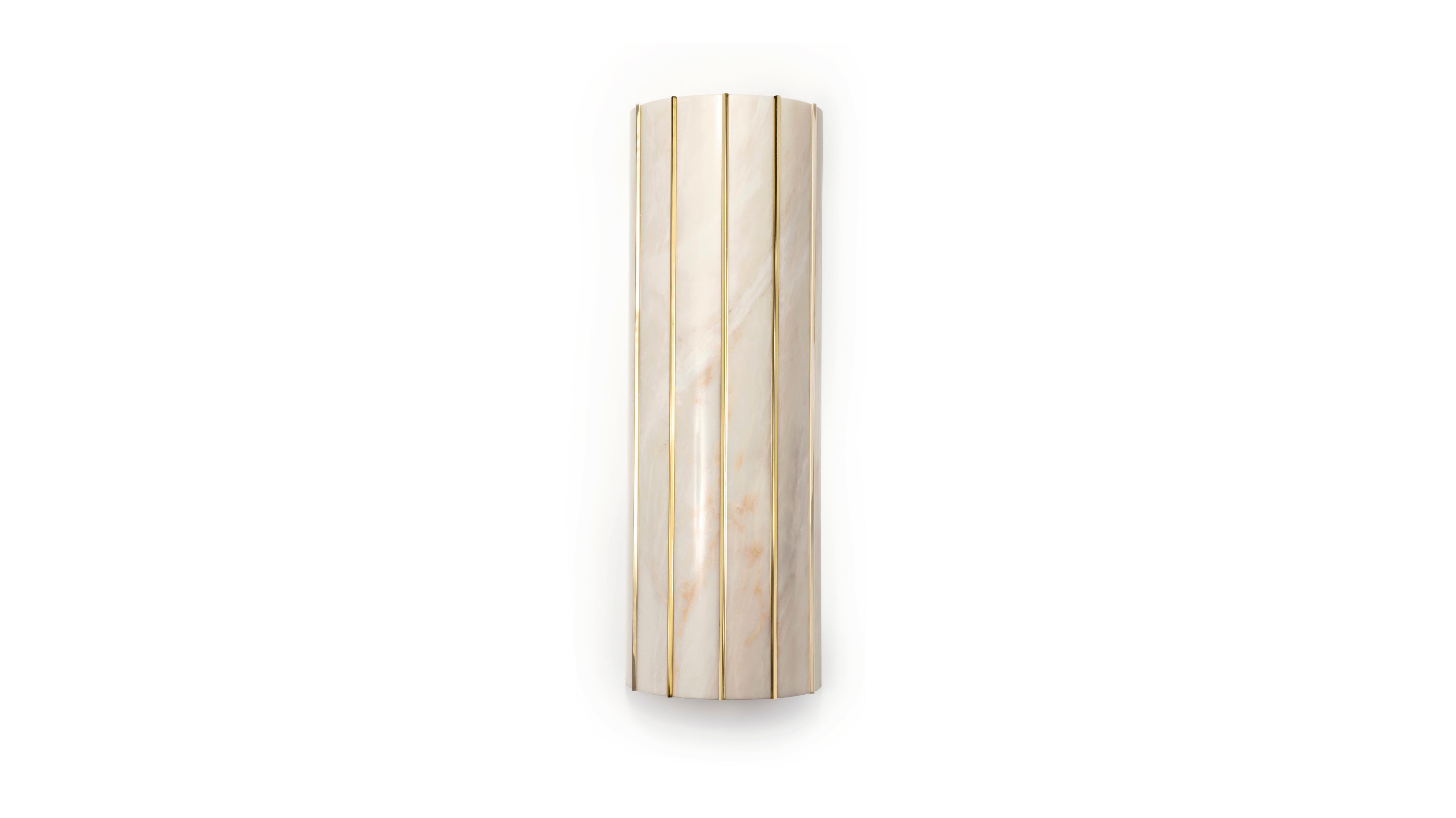 Seagram Estremoz Marble Wall Lamp by InsidherLand
Dimensions: D 8.5 x W 17 x H 50 cm.
Materials: Estremoz marble, polished brass.
4 kg.
Available in other marbles and metals.

The Seagram table lamp receives the name of the first attempt at
