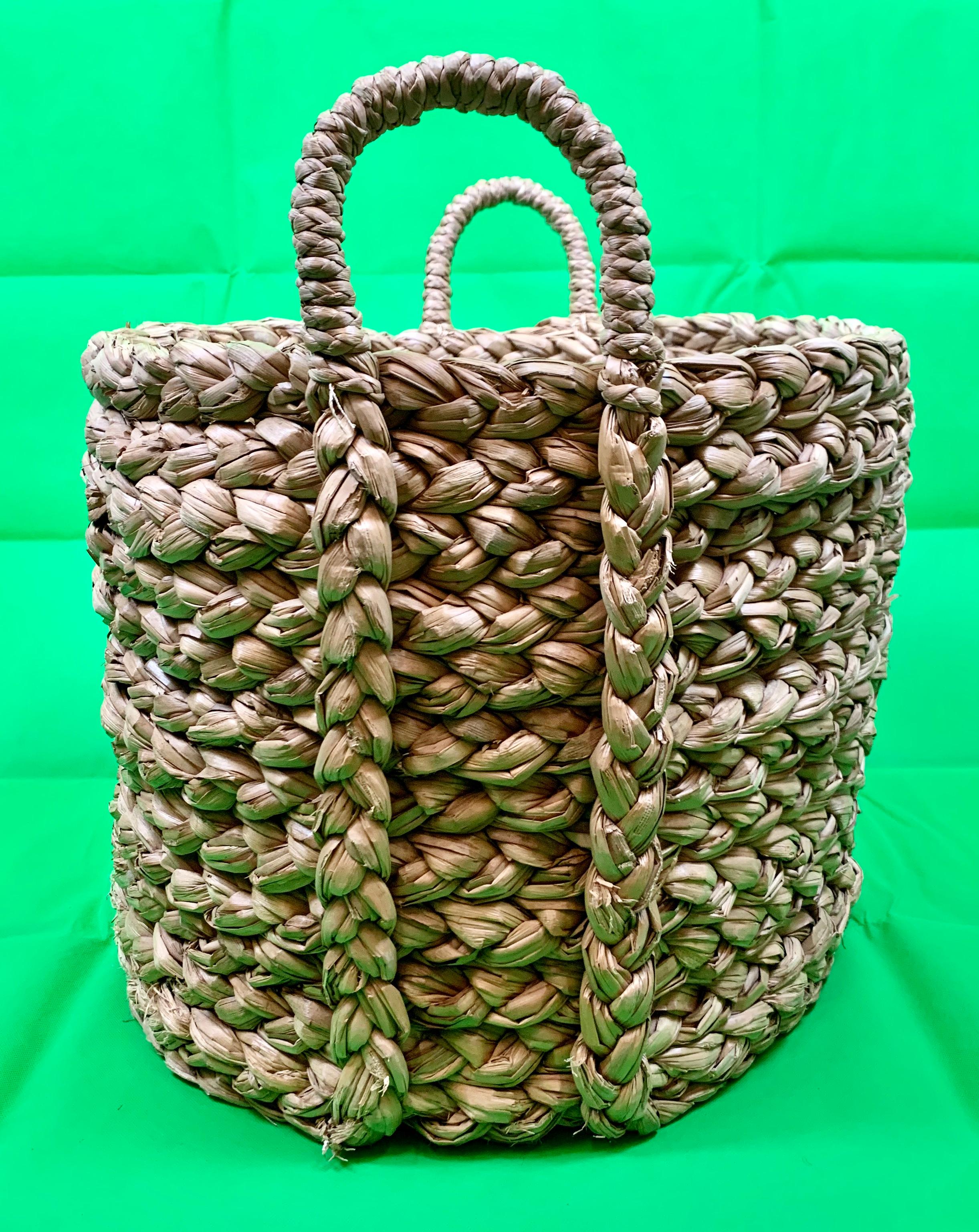 Large hand woven seagrass basket with two handles. Such a basket could have so may uses.
Perfect for logs next to a fireplace, general storage, laundry, children's toys, indoor tree........
H-17.75