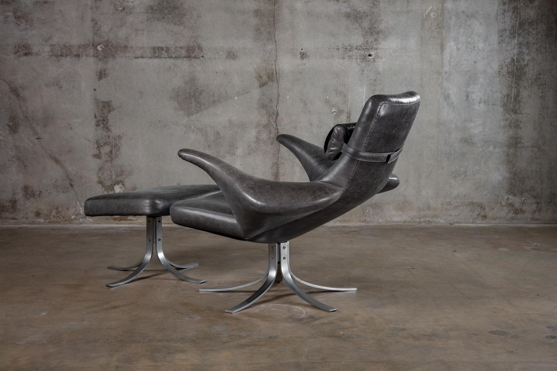 Seagull chair and ottoman in black leather.