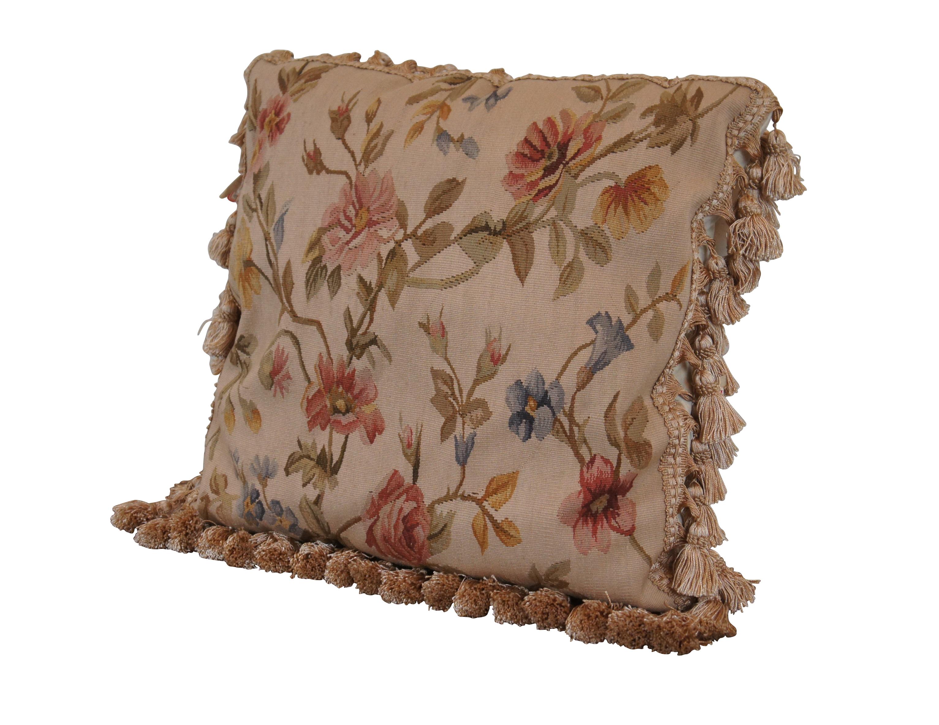 20th century square floral throw pillow, embroidered in wool with blue, pink, and yellow flowers on green-brown branches. Gold tassel trim. Cream velour back with zipper closure. Fiber filled. Made in China by Sea Gull Chinese