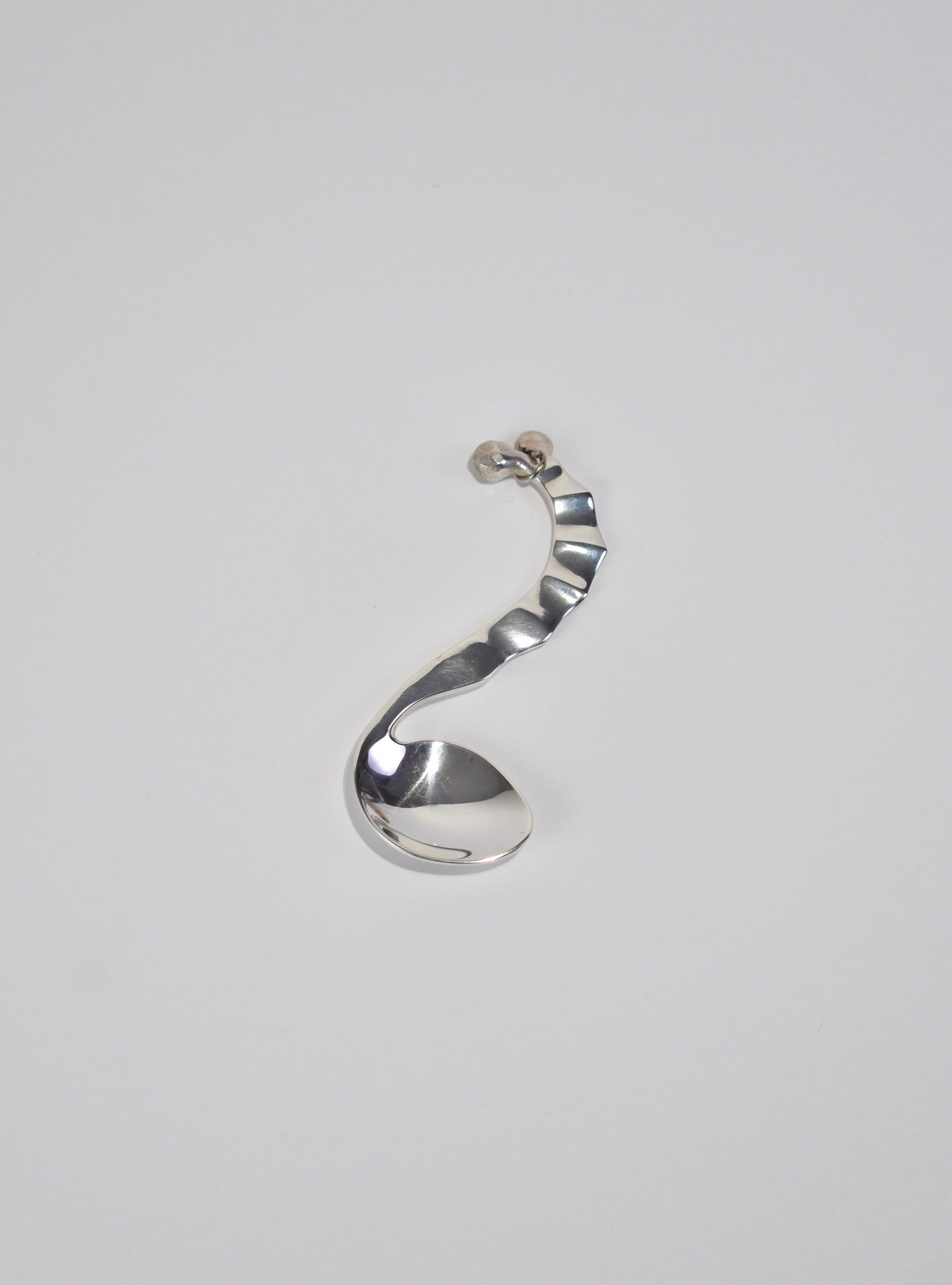 Silver plated sculptural seahorse baby spoon. May be used as a baby spoon or small serving spoon, by Izabel Lam.

Hand wash recommended, dry immediately after to retain shine.