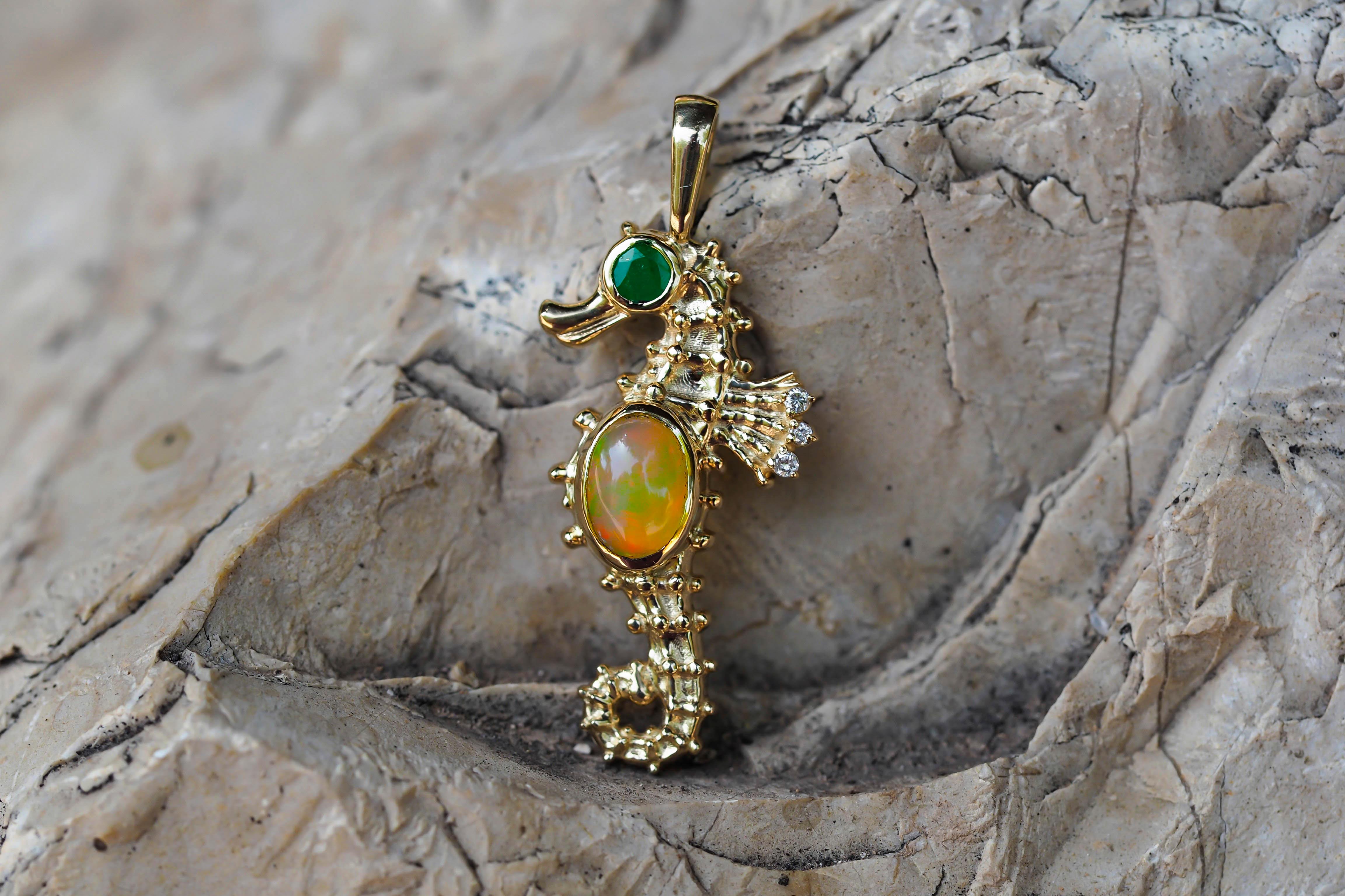 Seahorse pendant with opal. 
Multicolor Ethiopian Opal 14k gold pendant. Sea Animal Cute Horse Fish pendant. Sea, Beach Lover Pendant, Charm.

Metal: 14k gold
31x13.5 mm size
Weight 2.20 gr.

Gemstones:
Opal: oval cabochon shape, orange-yellow with