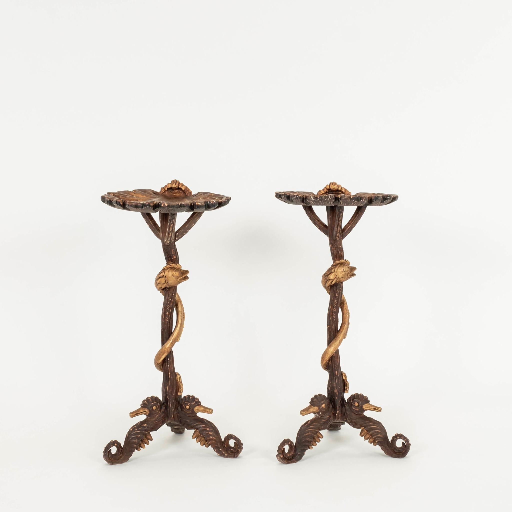 Wonderful patinated parcel gilt 20th century tall Venetian grotto occasional table featuring seahorse legs and serpent supporting shell table top, all carved in the Rococo style. Two available, sold individually
