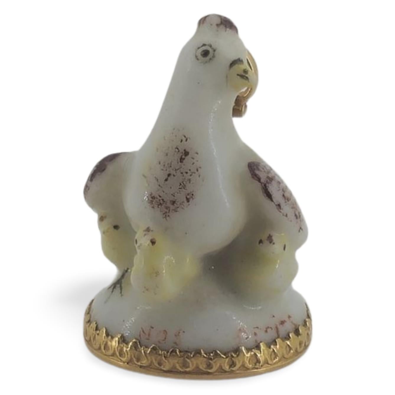 A marvellous little piece of porcelain from this little-known maker. A seal, or fob, only an inch high. It is in the form of a hen with her chicks, and is inscribed with the motto Nos Petits, or Our Children. Probably a gift from a husband to his