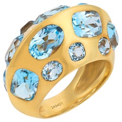 Seaman Schepps Anillo de oro amarillo de 18 quilates Antibes con topacio azul de 13,00 quilates