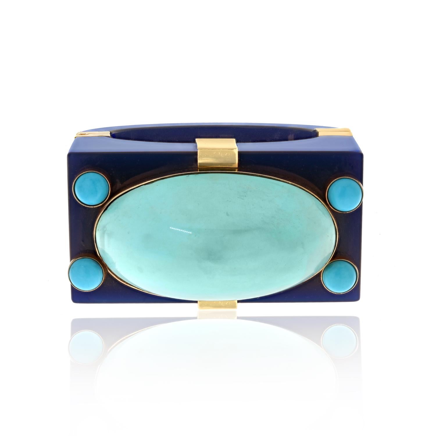 This Seaman Schepps architectural bracelet from the 1950s is a true testament to the unique design aesthetics of that era. Crafted in 14k yellow gold and featuring elements of bakelite and turquoise, it's not just a bracelet; it's a work of