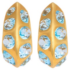 Boucles d'oreilles Antibes Seaman Schepps 18.00 carats topaze bleue or jaune 18k
