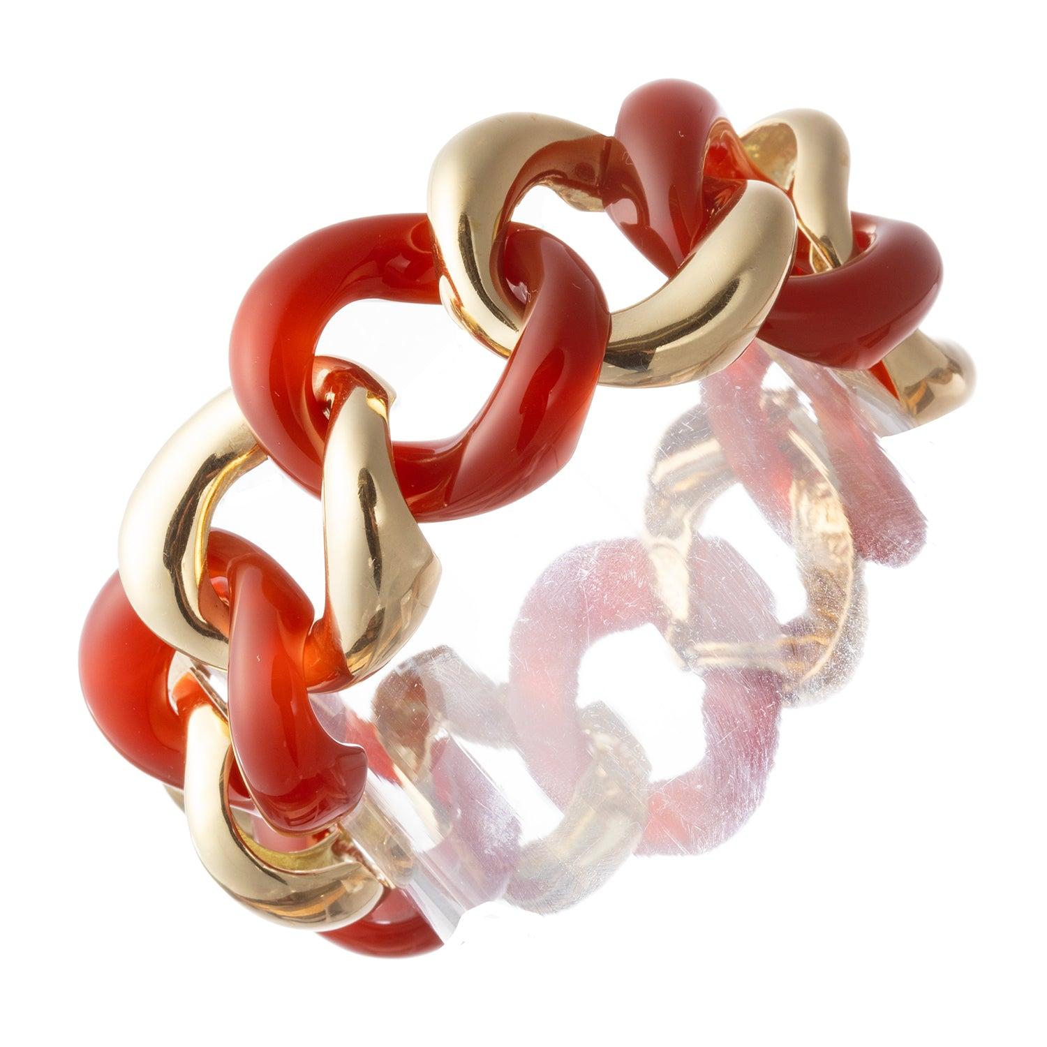 Seemann Schepps mittelgroßes Gliederarmband mit Gliedern aus 18 Karat Gelbgold, die sich mit geschnitzten Gliedern aus rotem Karneol abwechseln; ein Glied ist ein verdeckter Verschluss mit Druckverschluss und Sicherheitsverschluss. Mess 7,75 Zoll in