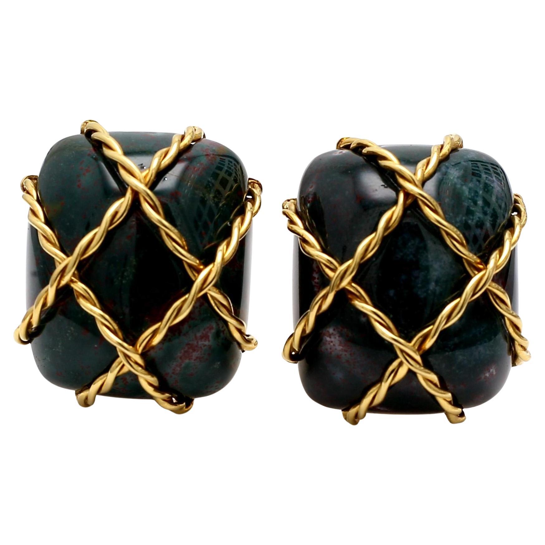 Seaman Schepps Boucles d
oreilles à clip vintage en or jaune 18K serties de pierres de sang