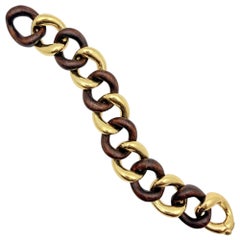 Pulsera de eslabones medianos de madera de nogal y oro amarillo de 18 quilates de Seaman Schepps