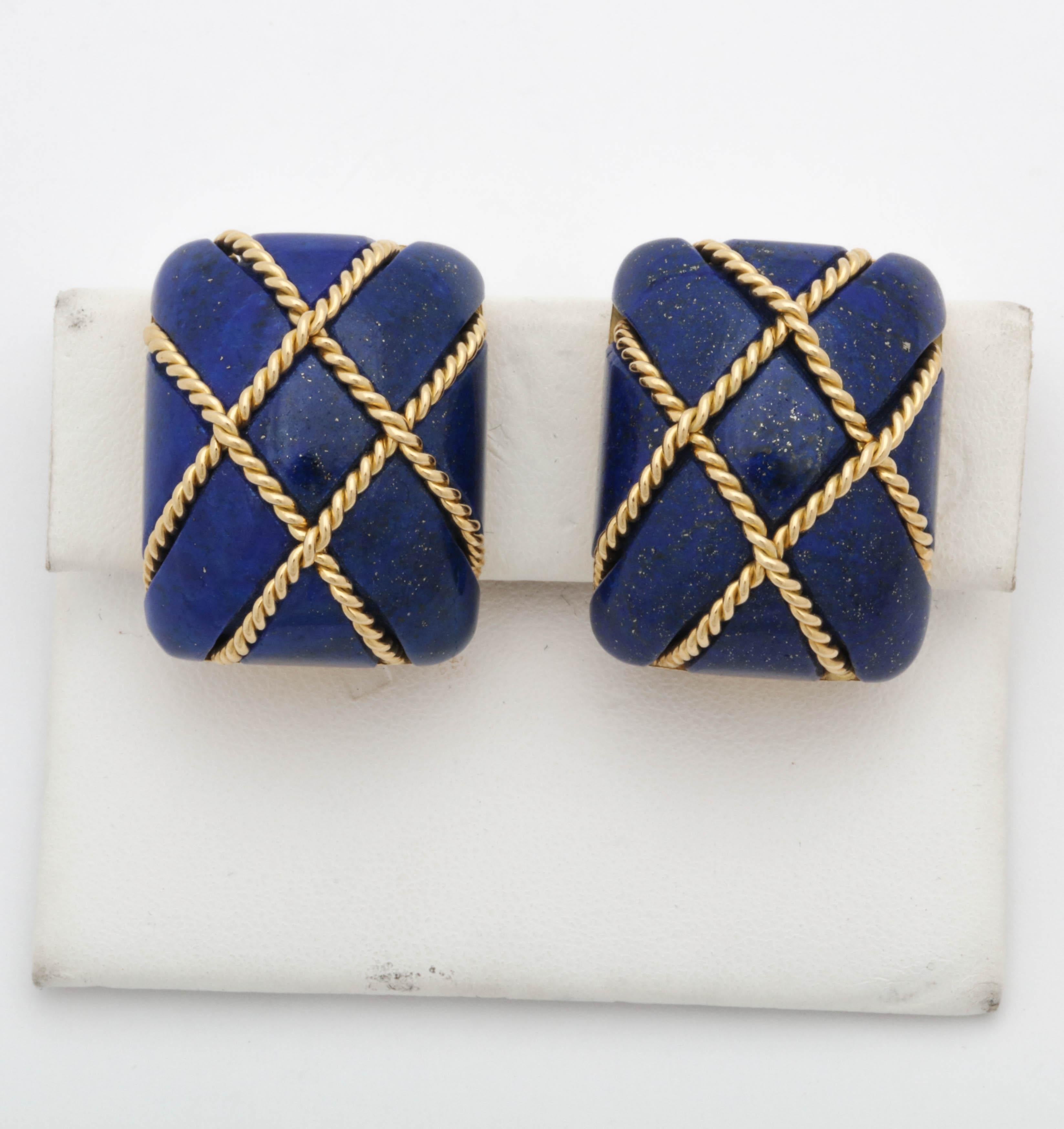 One Pair Of Ladies Seaman Schepps Earrings Composed Of 18kt Yellow Gold In The Cage Rope Design. Centering A Large 25 MM Sugarloaf Cut Lapis Lazuli Sto,ne. Clip On Backs,NOTE: POSTS May Be Added For Pierced Ears.Serial # P 20045. American Made.
