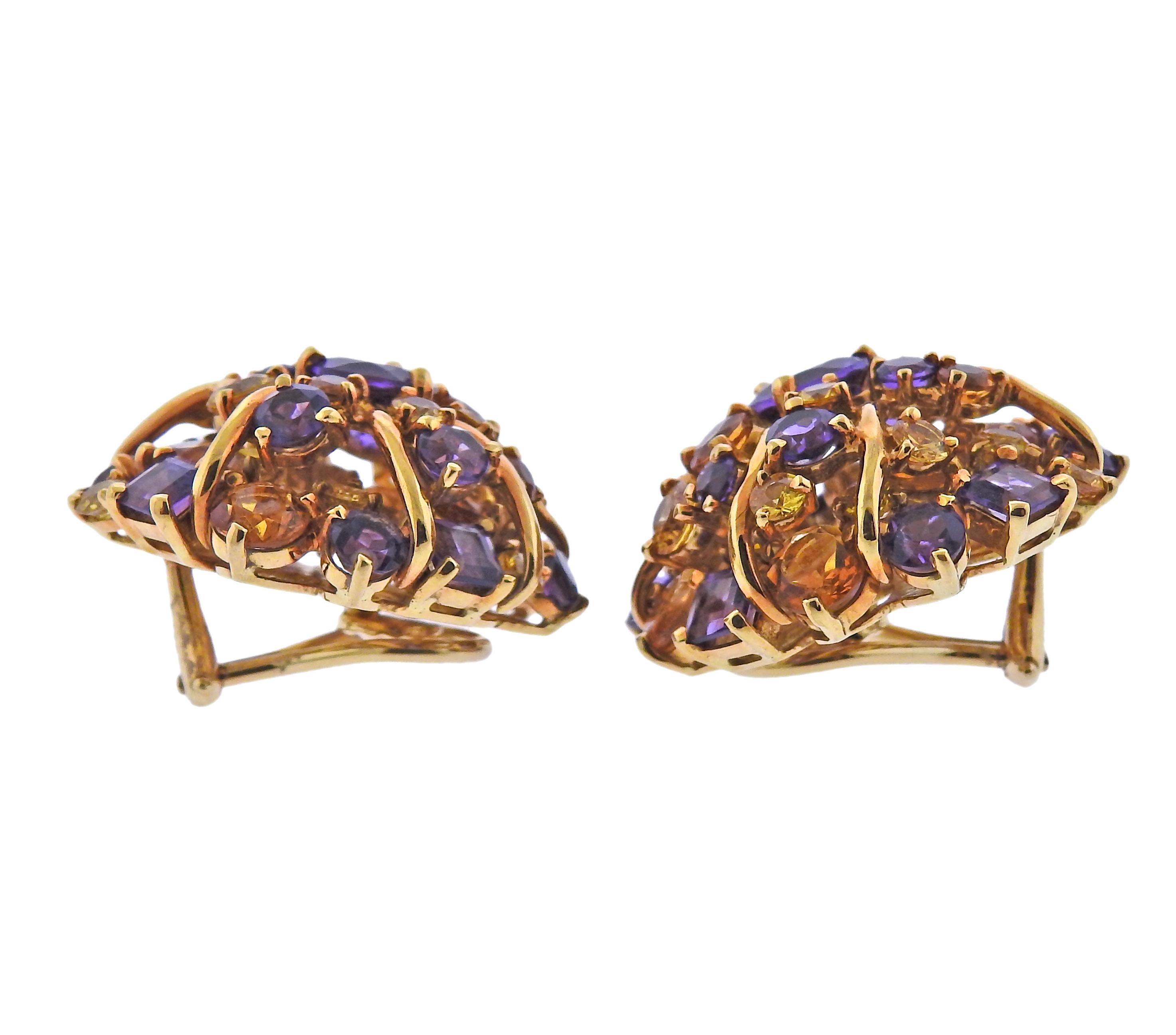 Pair of 18k yellow gold cocktail earrings by Seaman Schepps, with amethyst and citrines. Come with Seman Schepps pouch. Earrings are 26mm in diameter.  Weight - 29.8 grams. Marked: Shell mark, 750, 7607. 