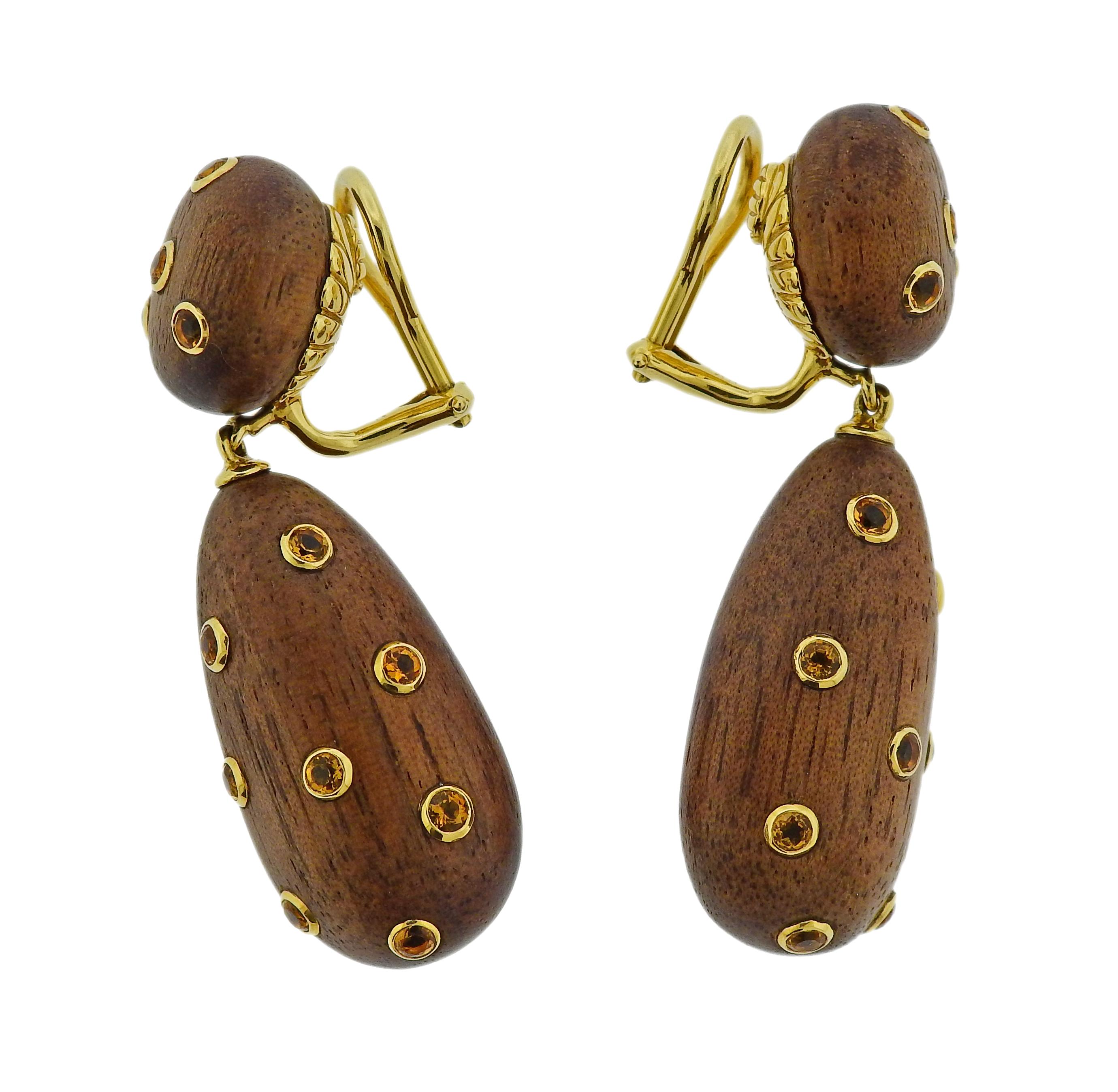 18k yellow gold and wood drop earrings by Seaman Schepps, adorned with citrines. Retail $6350. Earrings are 45mm x 15mm. Weight 9.9 grams. Marked 750, Shell mark, Seaman Schepps