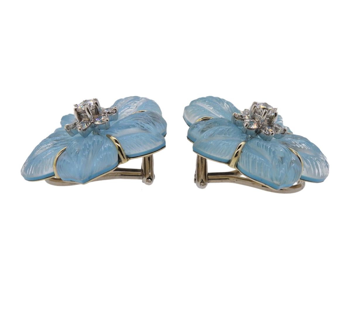  Delicate 18k gold Clematis flower earrings by Seaman Schepps, decorated with turquoise and carved crystal petals, and approx. 0.78ctw in G/Vs diamonds in the center. Come with box.  Earrings are 25mm x 25.5mm, weigh 15 grams. Marked: Seaman