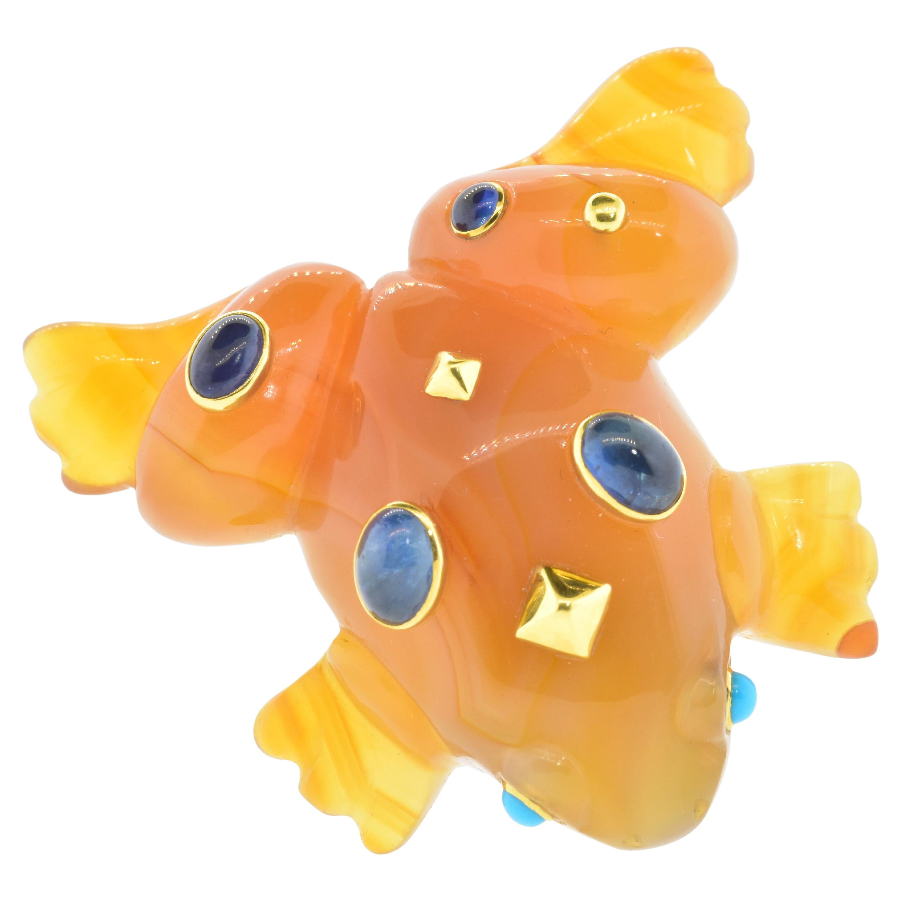Contemporary Seaman Schepps' Famous Frog Brooch in 8K Carved Carnelian and Sapphires For Sale