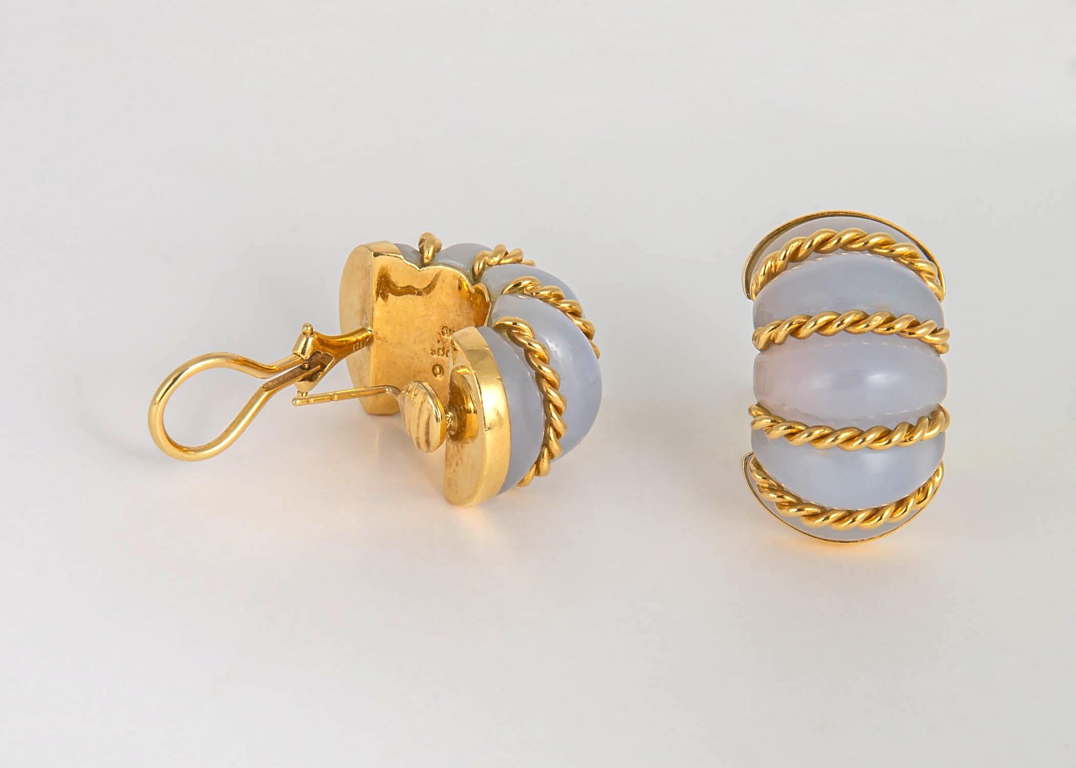 Seaman Schepp's shrimp design earrings are a true classic. This pair features chalcedony. The soft unique color has been used in fine jewelry for many decades. Approximately 1 inch in length.