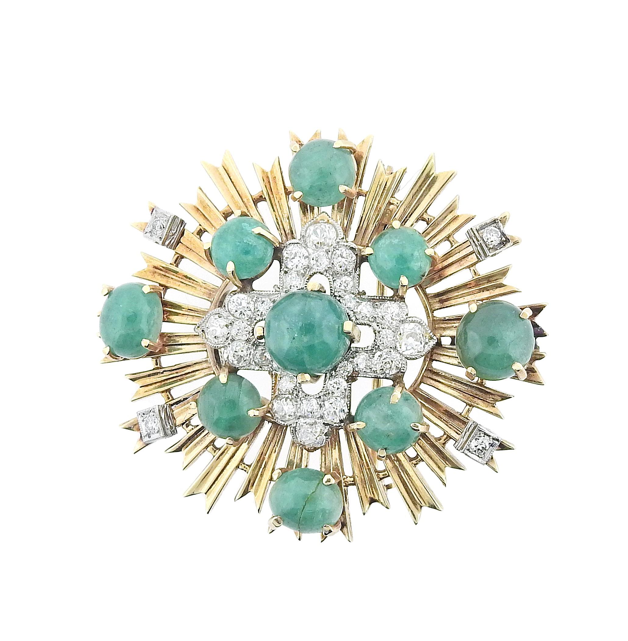 Vintage 14k gold Seaman Schepps brooch, with emerald cabochons and approx. 1.80ctw VS/H diamonds. Brooch measures 50mm x 45mm. Marked: 14k, Seaman Schepps. Weight is 33.3 grams.