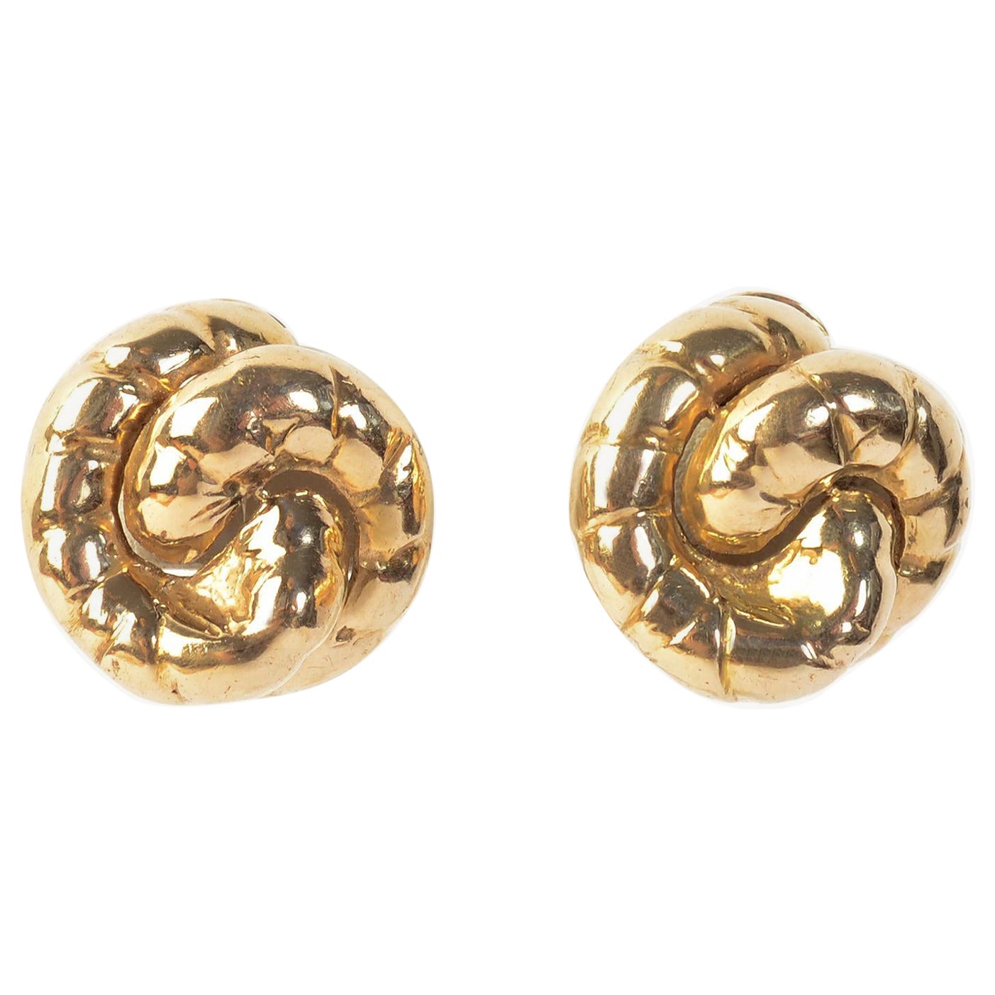 Boucles d'oreilles Seaman Schepps en or avec tourbillons